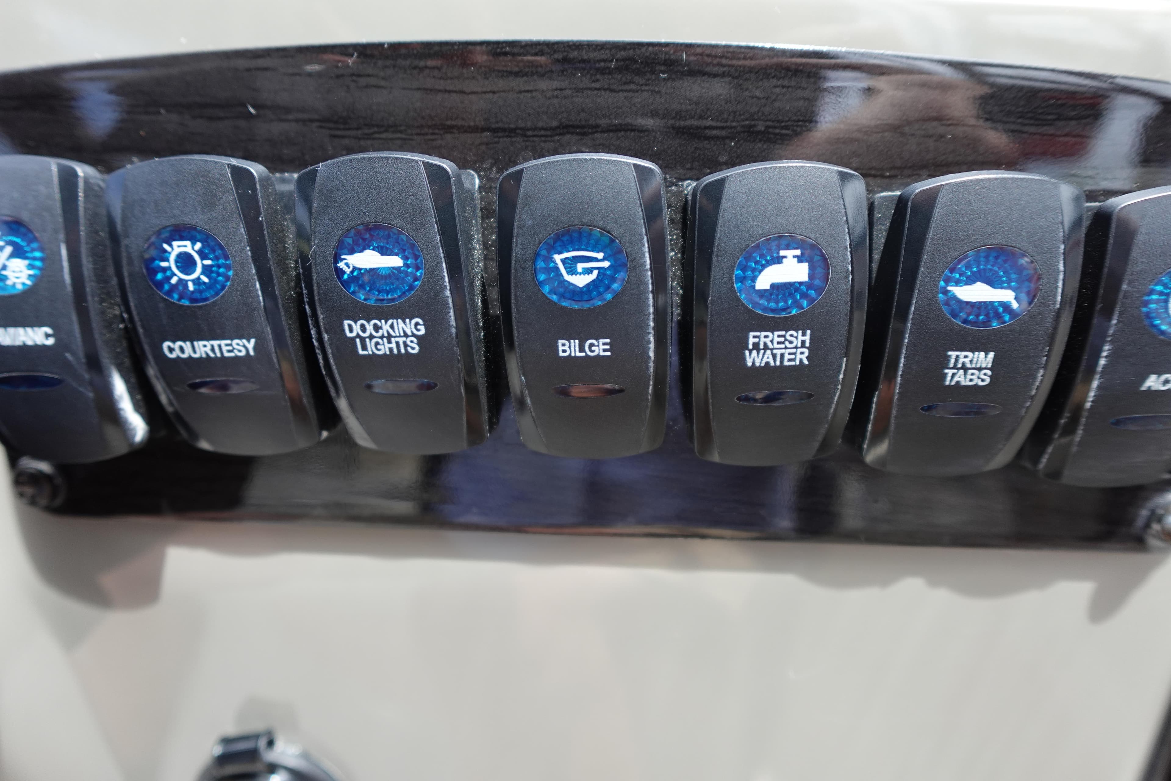 Control panel switches on a 2022 Stingray 231 DC boat.