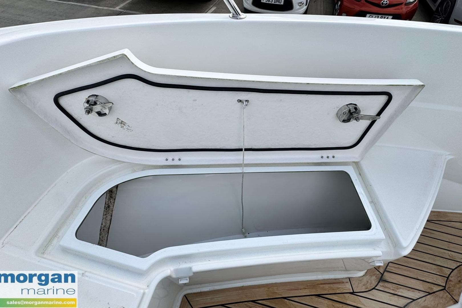 Open storage compartment on 2019 Jeanneau Cap Camarat 7.5 CC Serie 2 boat.