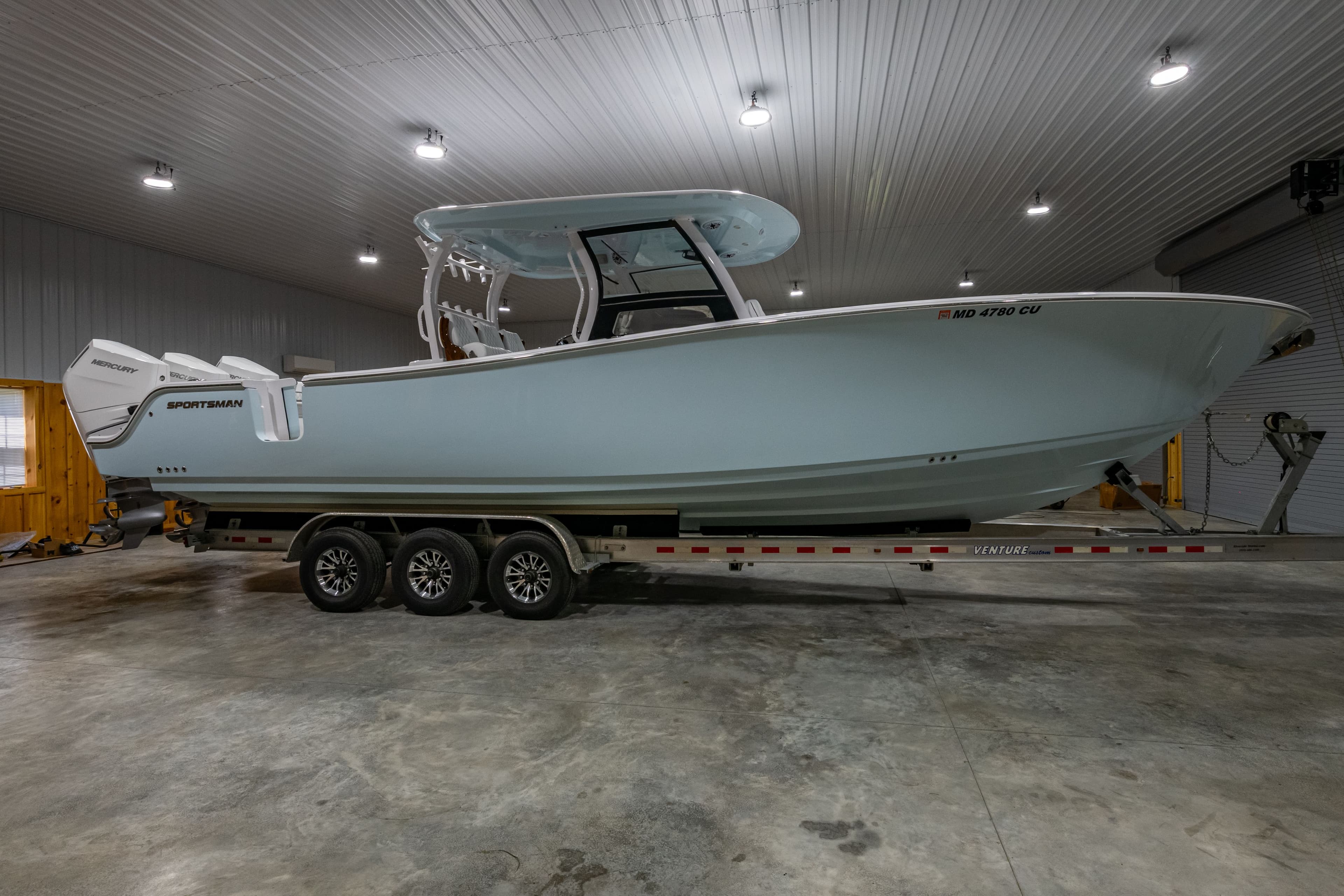 2023 Sportsman Open 352 Center Console on trailer in warehouse.
