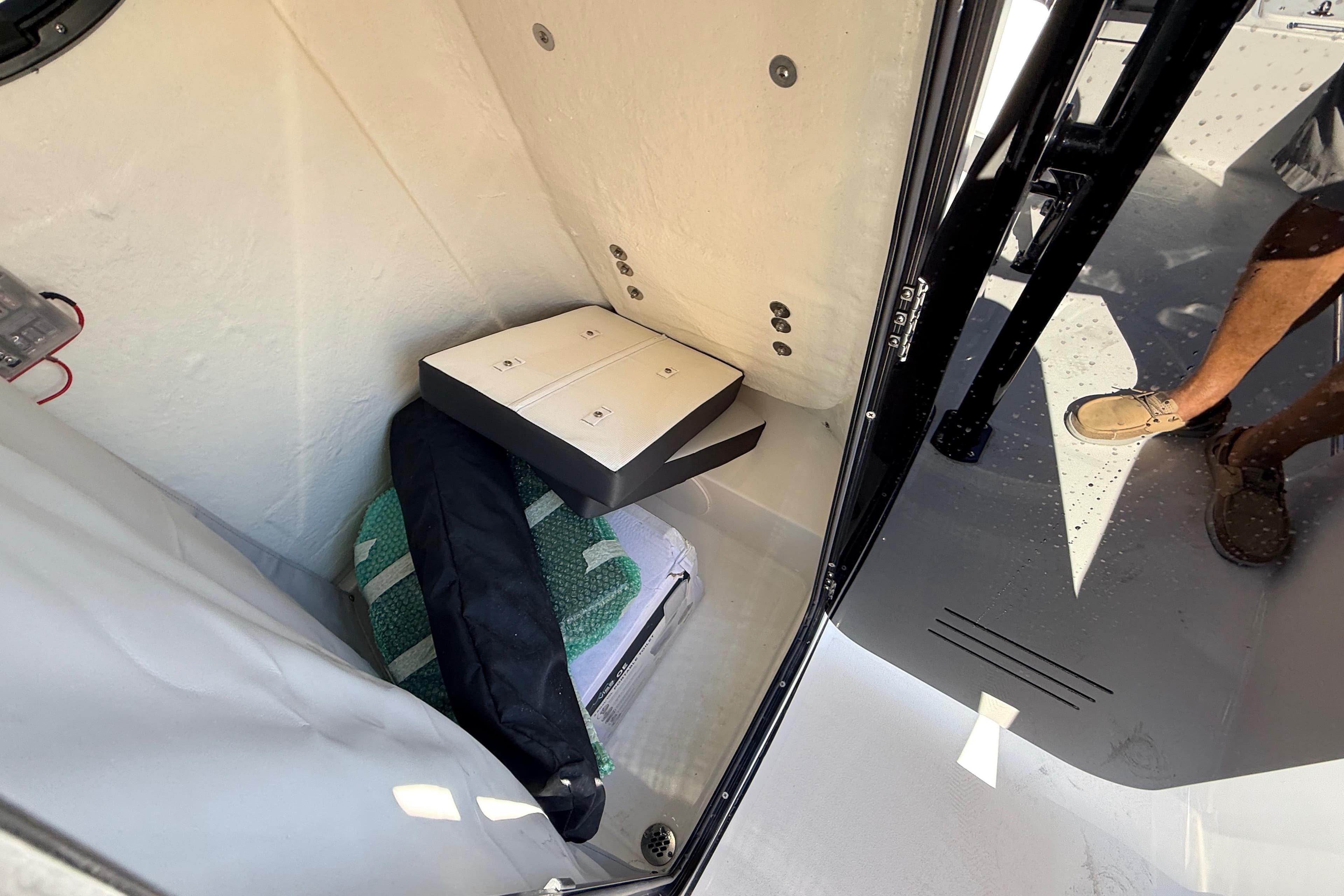 Interior view of 2025 Sea Pro 225FLX Sandbar boat storage compartment.
