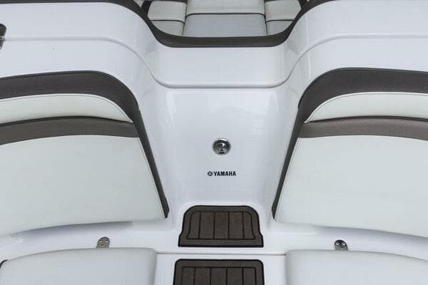 2016 Yamaha Boats 242 Limited S E-Series interior seating, white and brown upholstery.