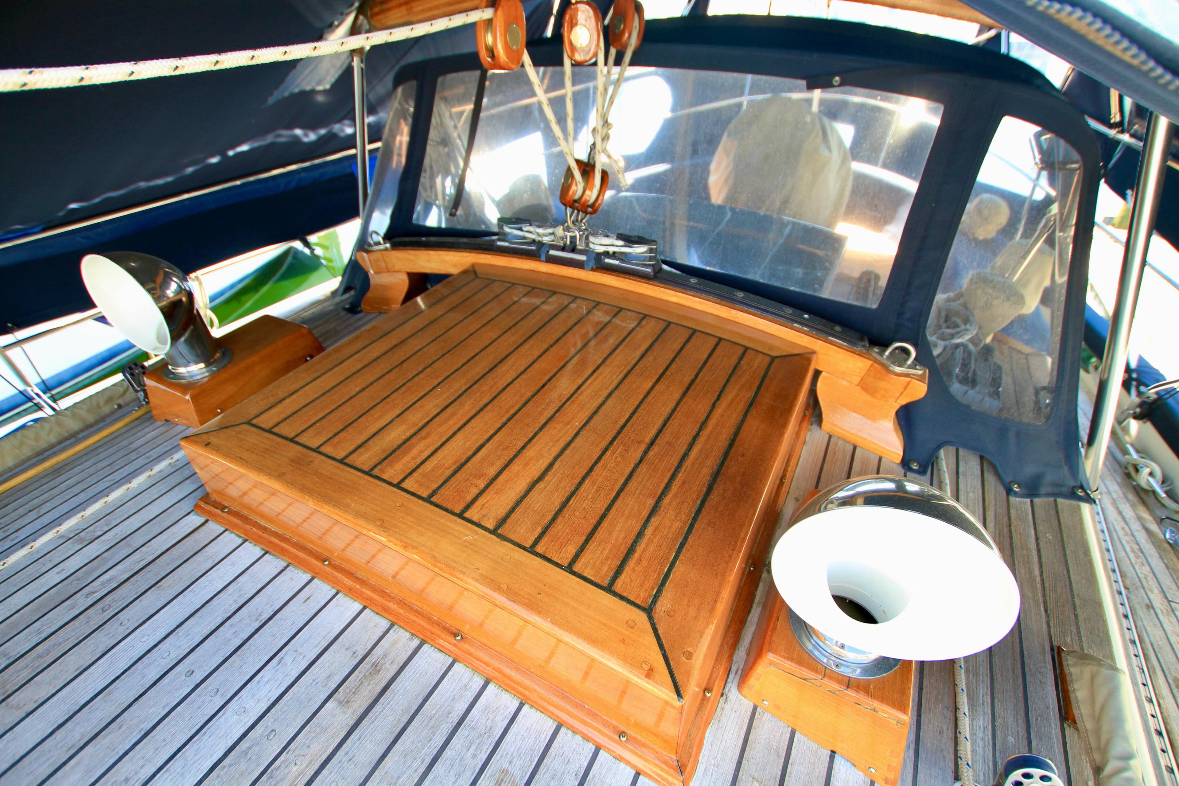 1981 Ta-Shing Panda 40 yacht deck with wooden details and ventilation.