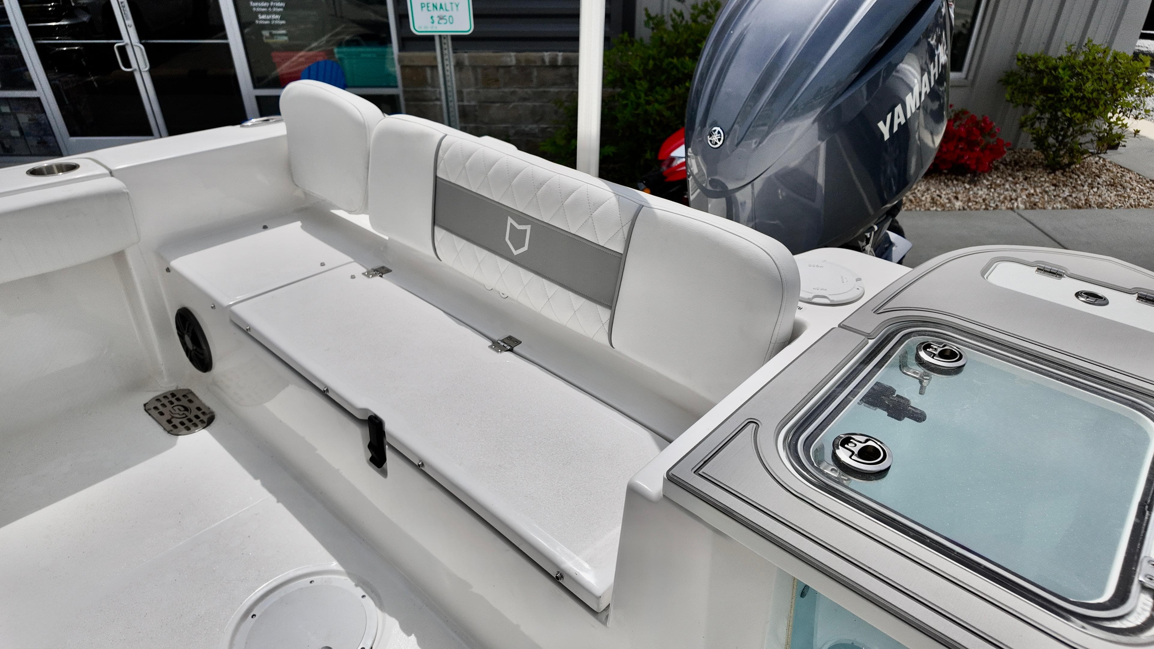 2025 Sea Fox 228 Commander boat interior with seating and Yamaha engine.