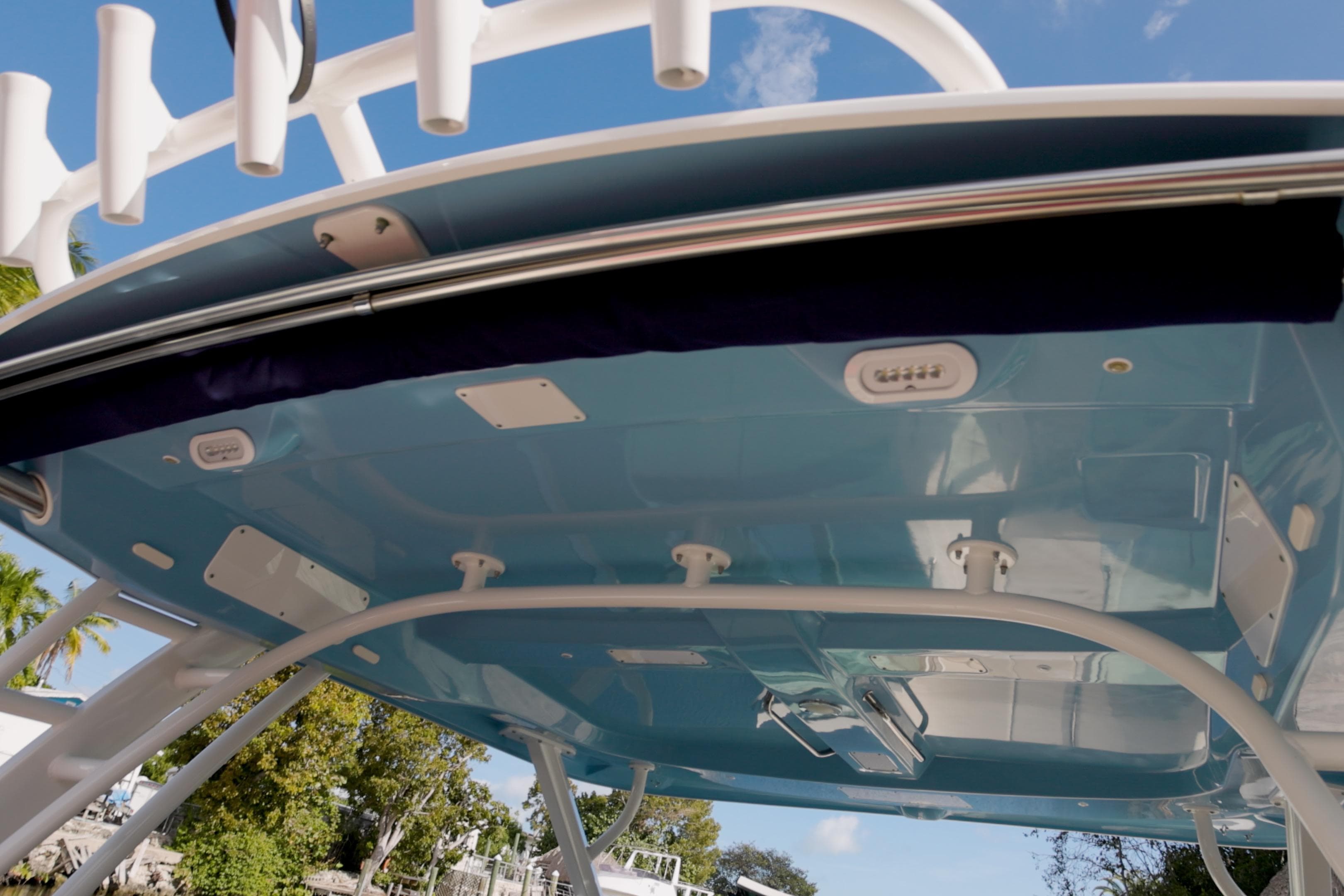 2023 Boston Whaler 320 Vantage boat canopy, underside view with blue sky background.
