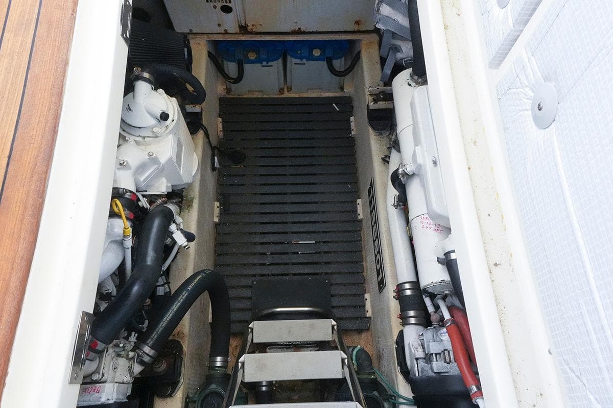 Engine compartment of a 2006 Sabre 38 Hard Top Express boat, showcasing mechanical components.