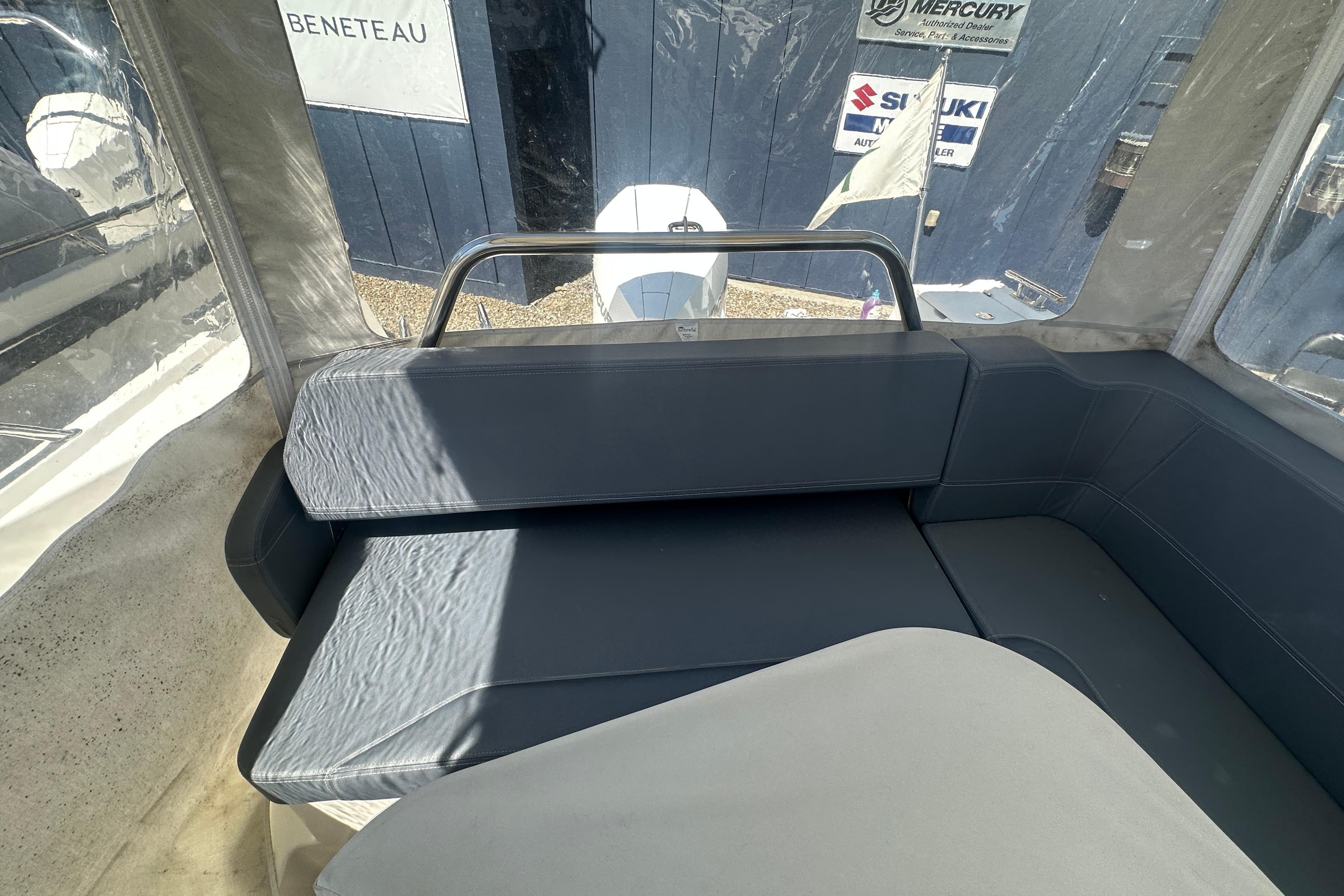 Interior seating of 2023 Nimbus Weekender 9 boat, featuring sleek, modern design.