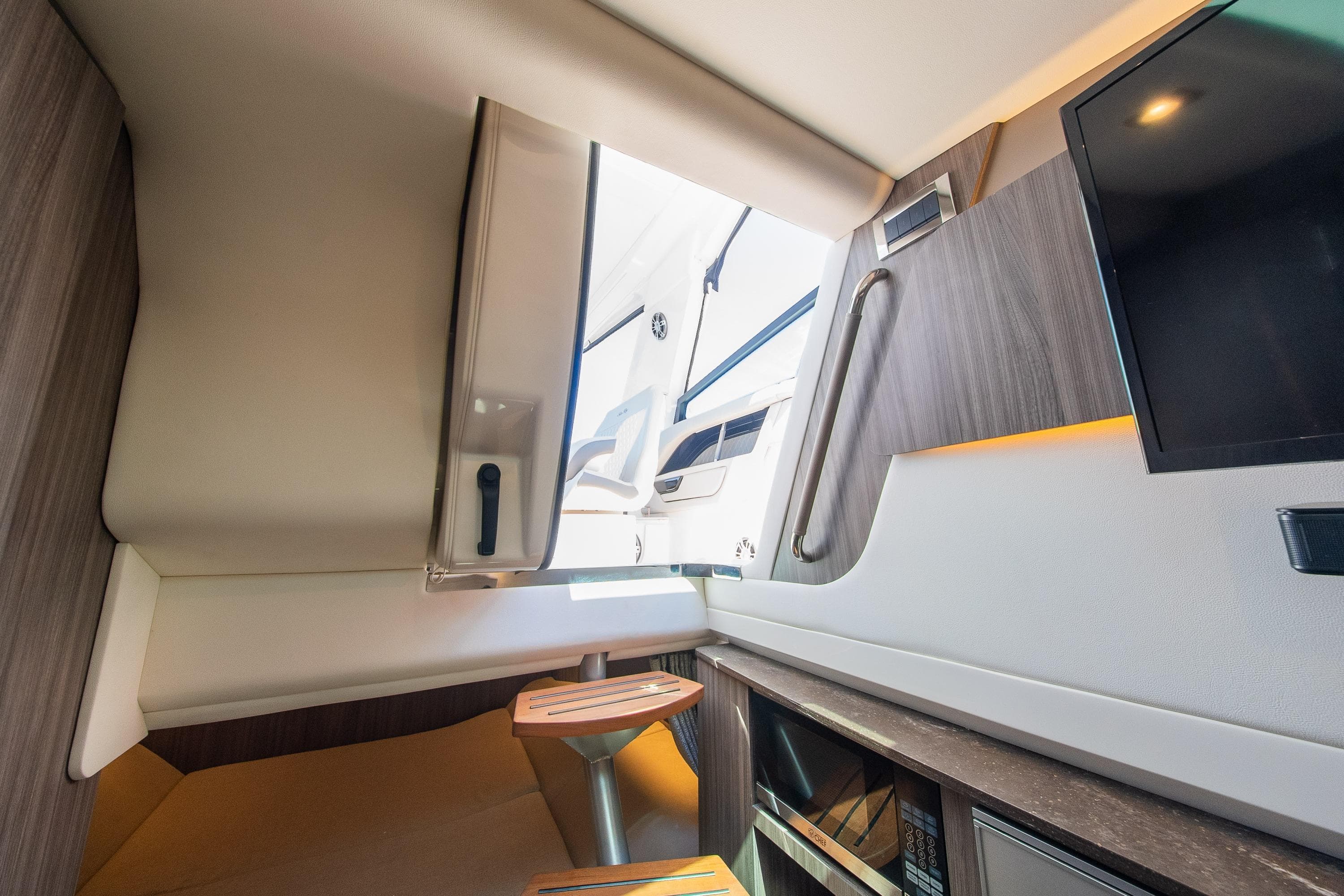 Interior of 2023 Sea Ray SLX 400 yacht, featuring modern design and amenities.