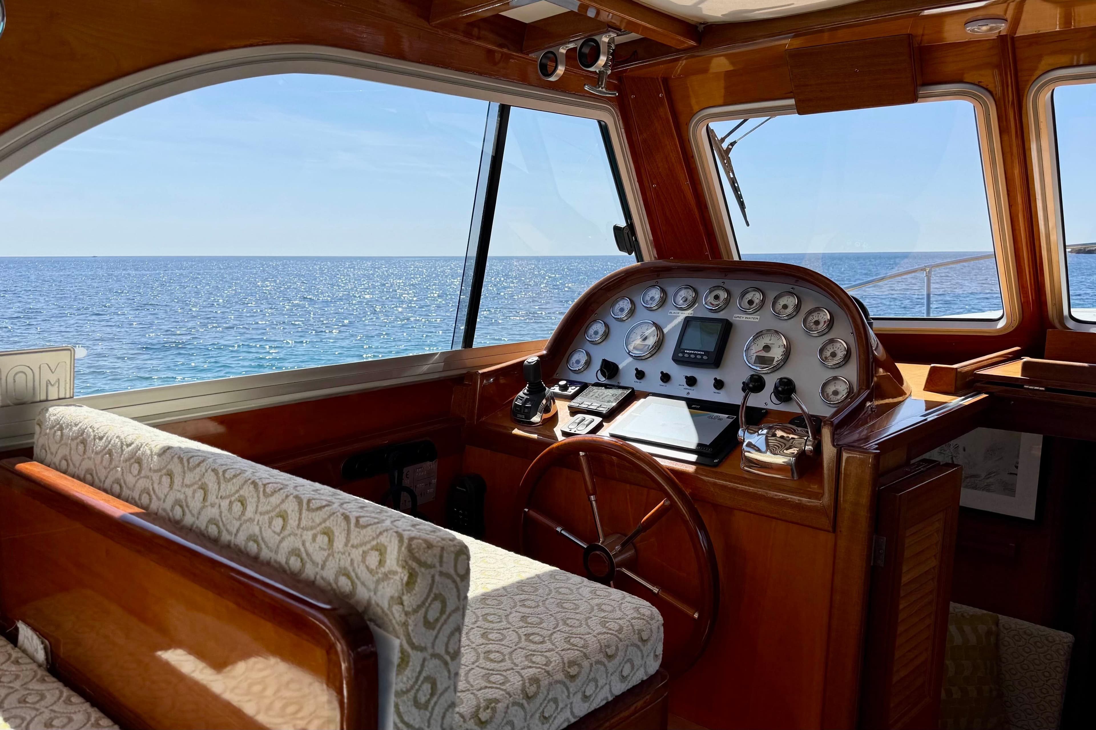 Interior of 2009 Bani 11,50 Prestige yacht with ocean view through windows.