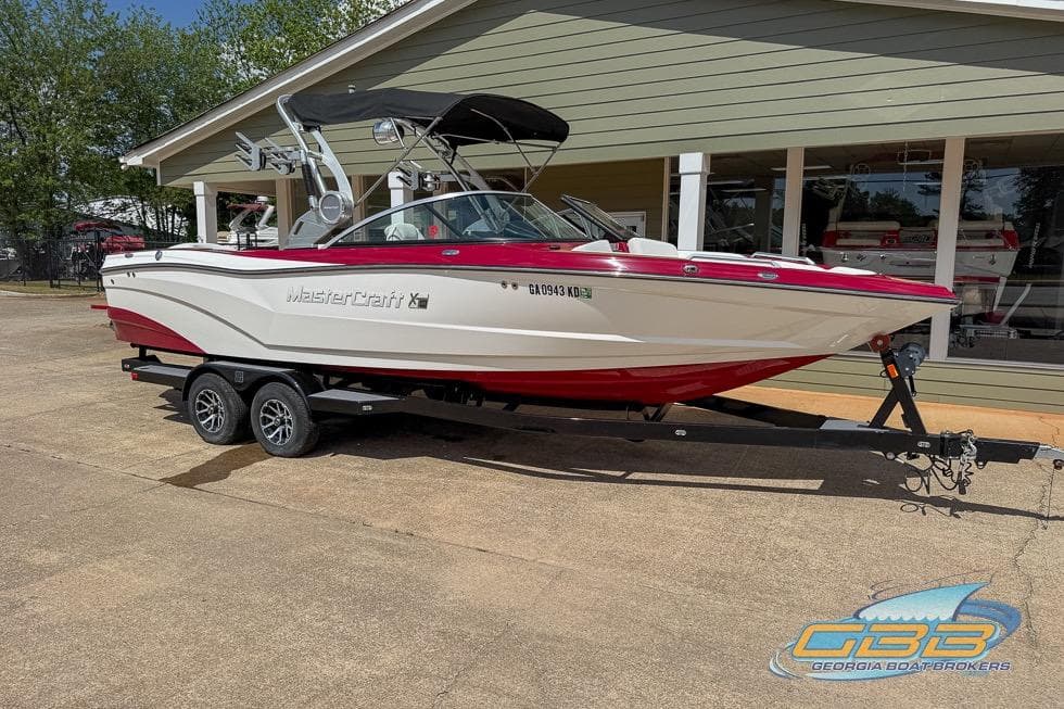 2018 MasterCraft XT25 boat on trailer outside Georgia Boat Brokers.