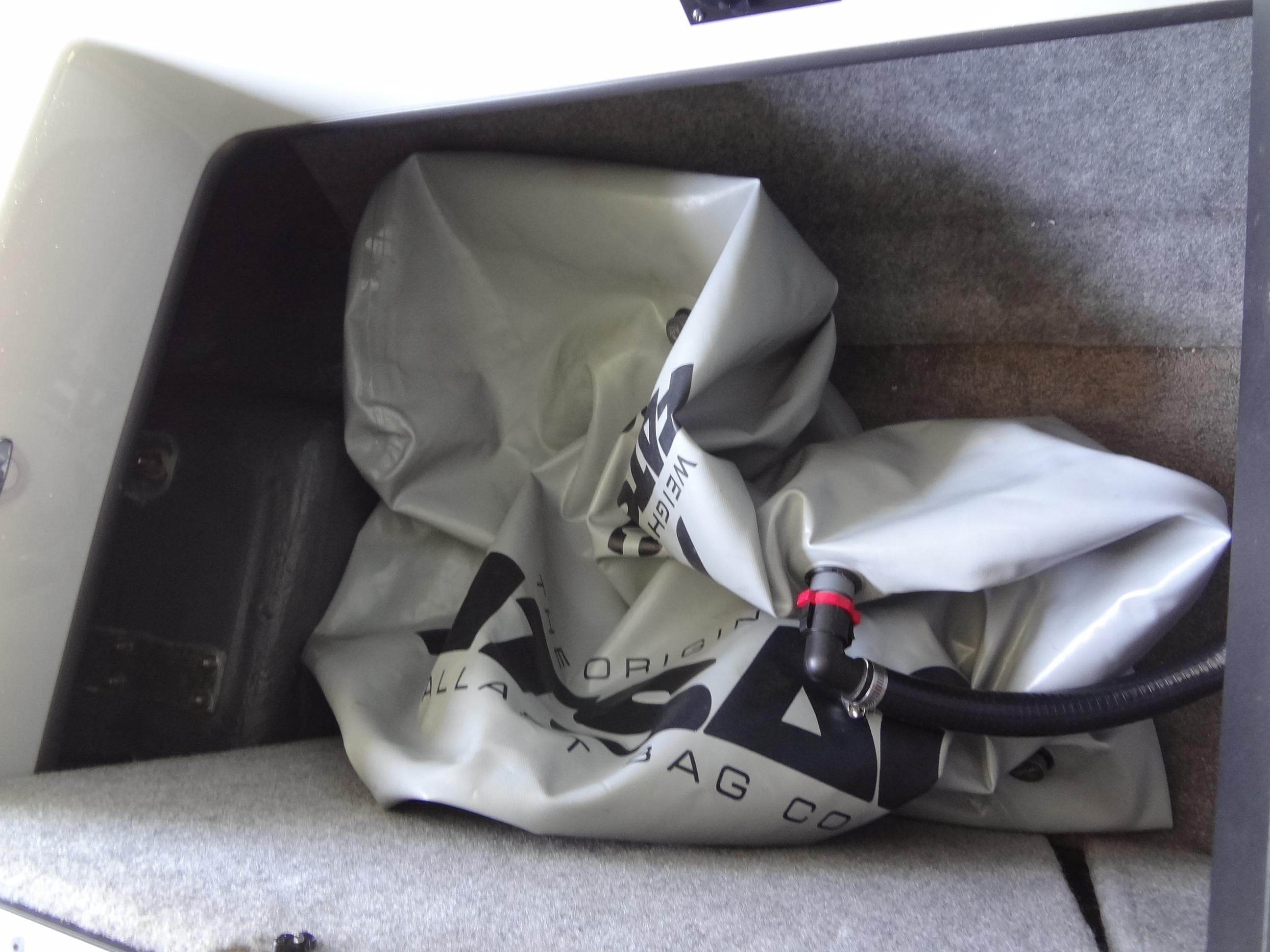 2022 Sanger V237 S ballast bag in storage compartment.