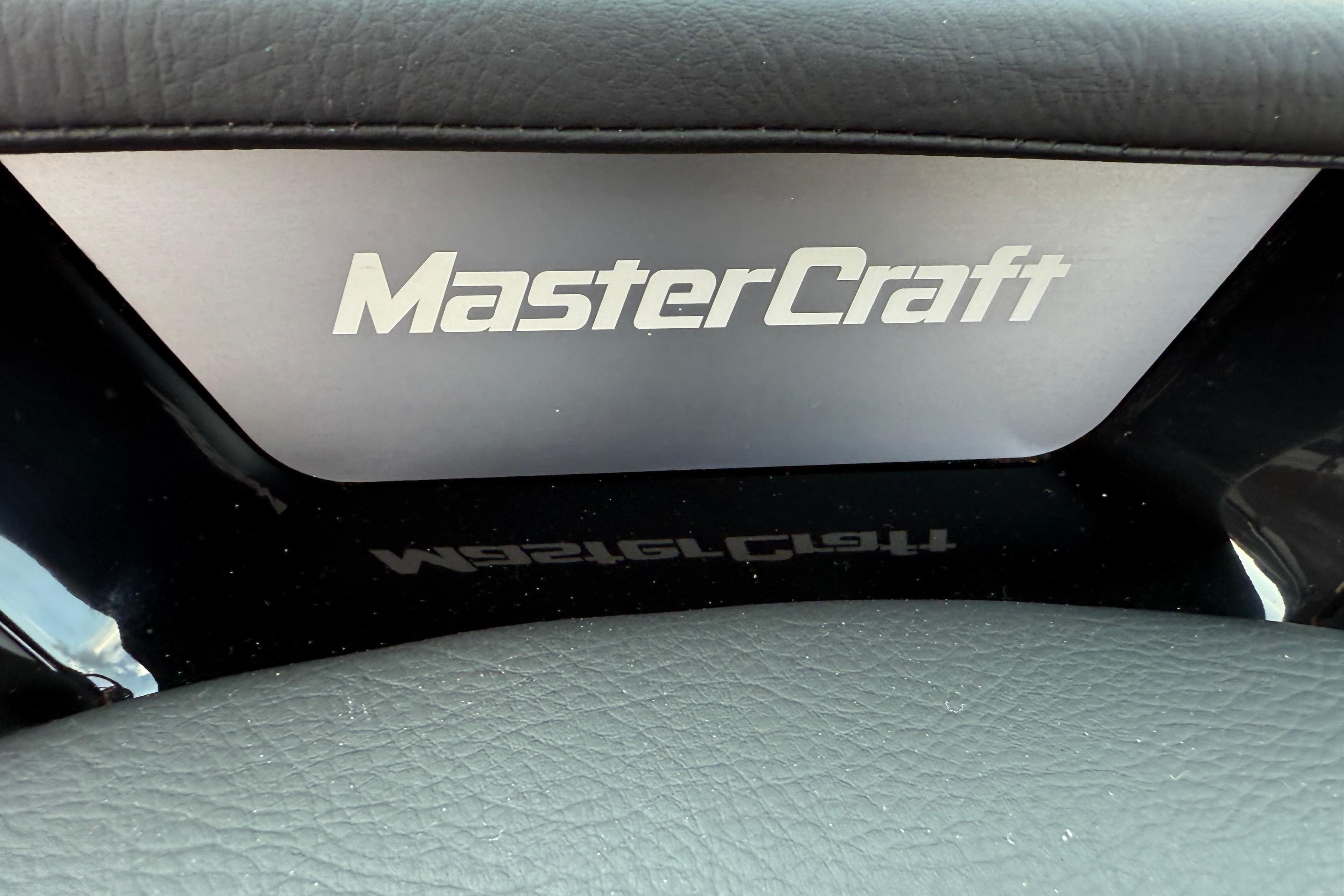 2025 MasterCraft NXT24 logo on a sleek, modern dashboard.