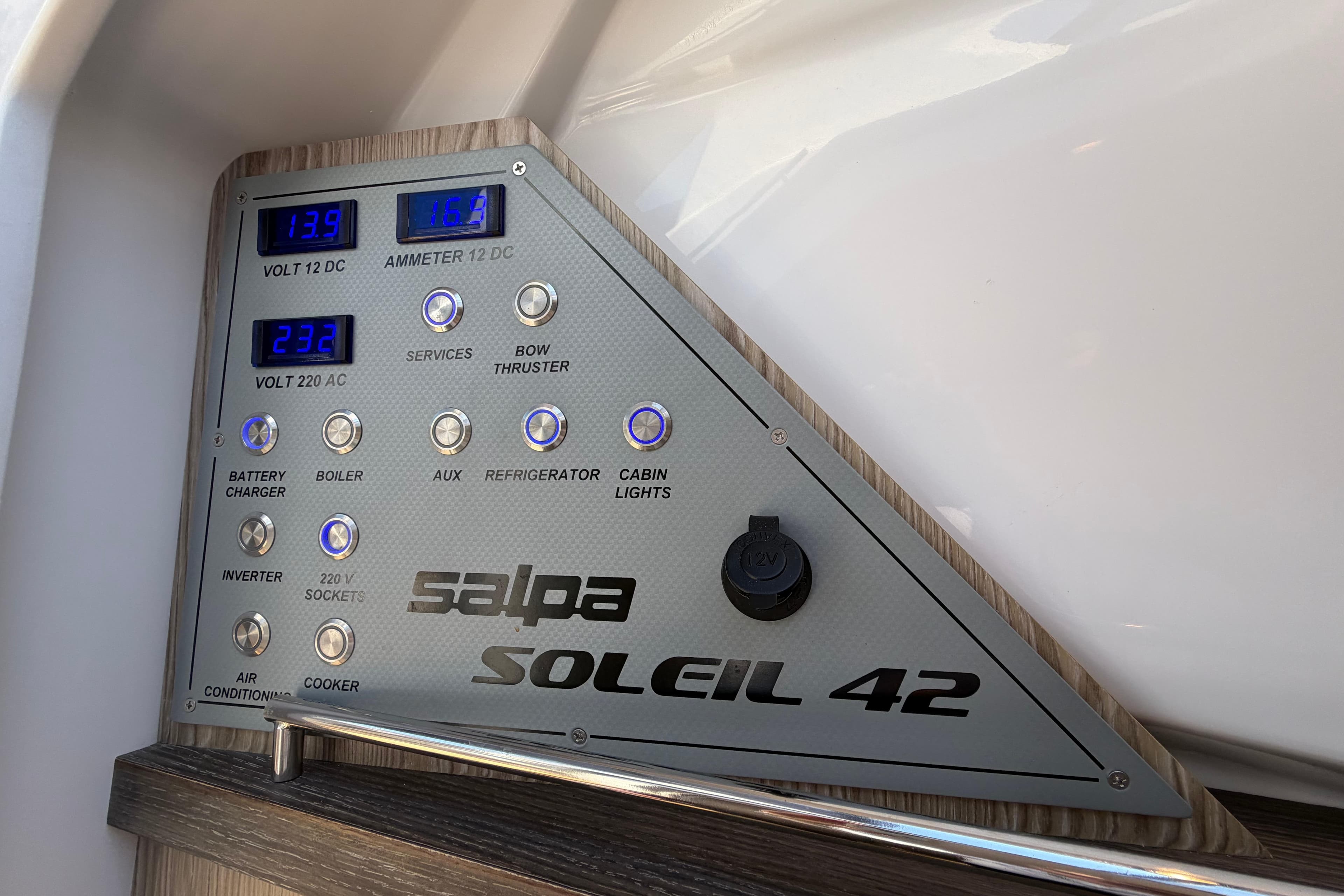 Control panel of 2024 Salpa Soleil 42 T-Top boat with voltage and ammeter displays.