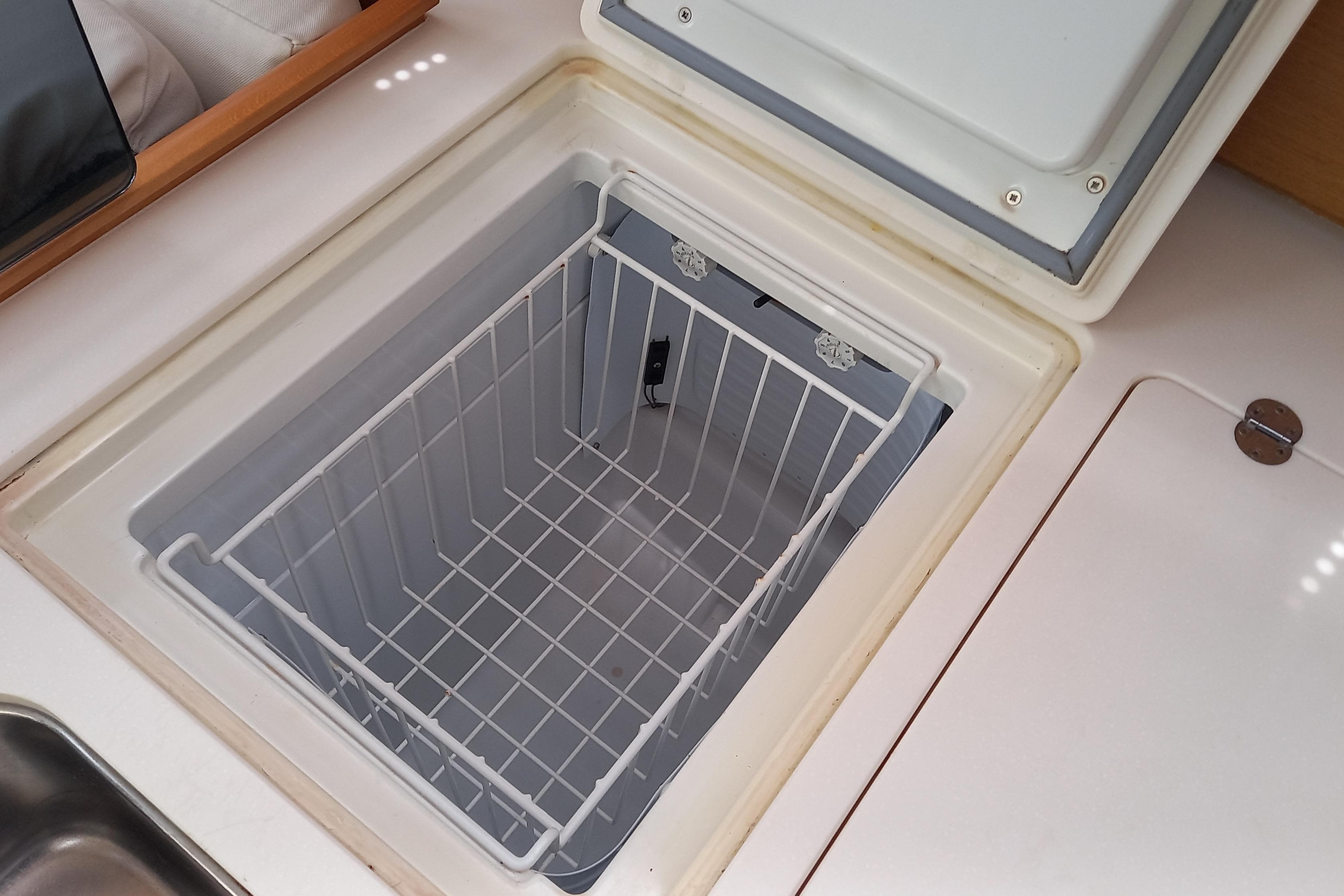 Open storage compartment on 2011 Jeanneau Sun Odyssey 45 DS yacht.