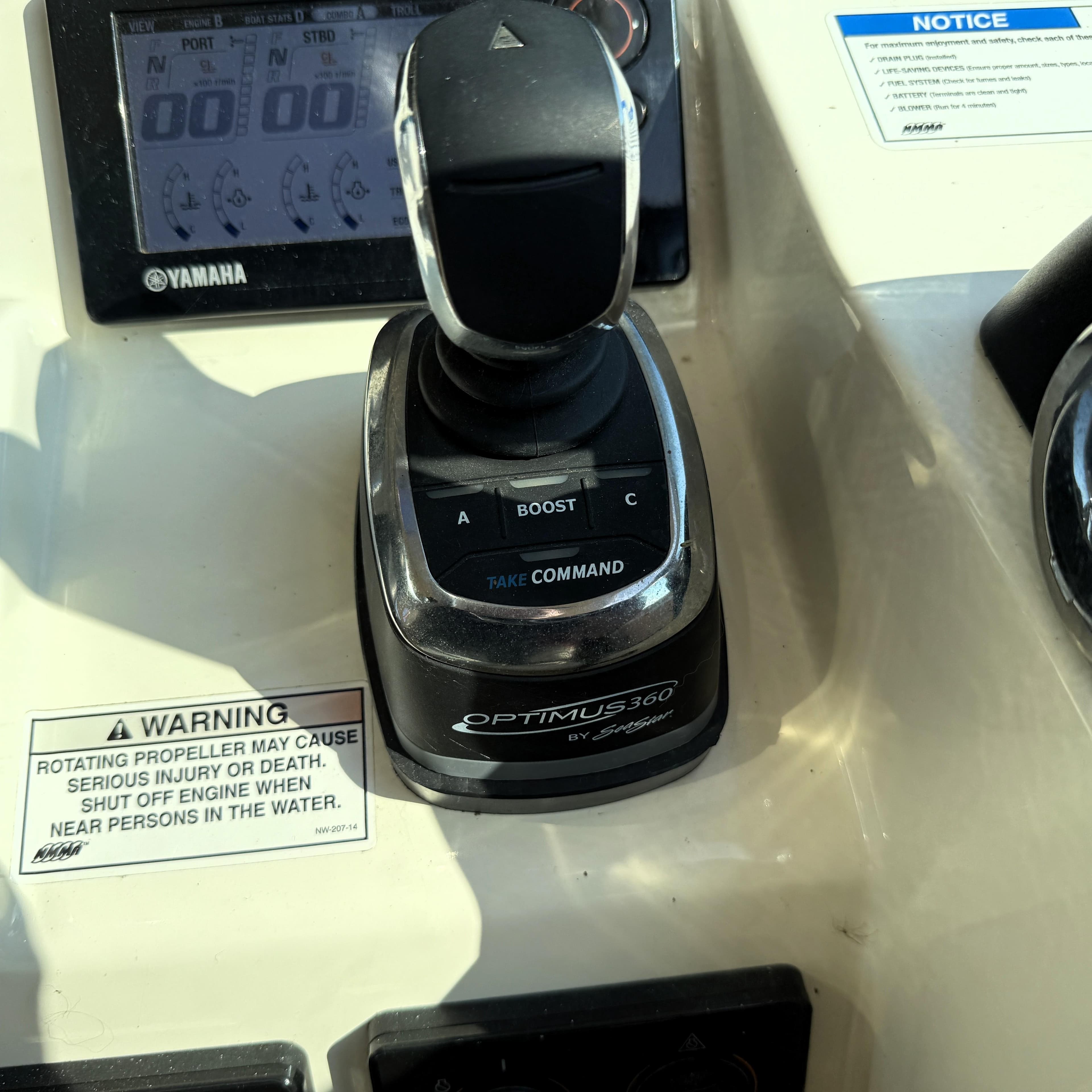 Control panel of a 2016 World Cat 320 DC boat with Optimus 360 joystick.