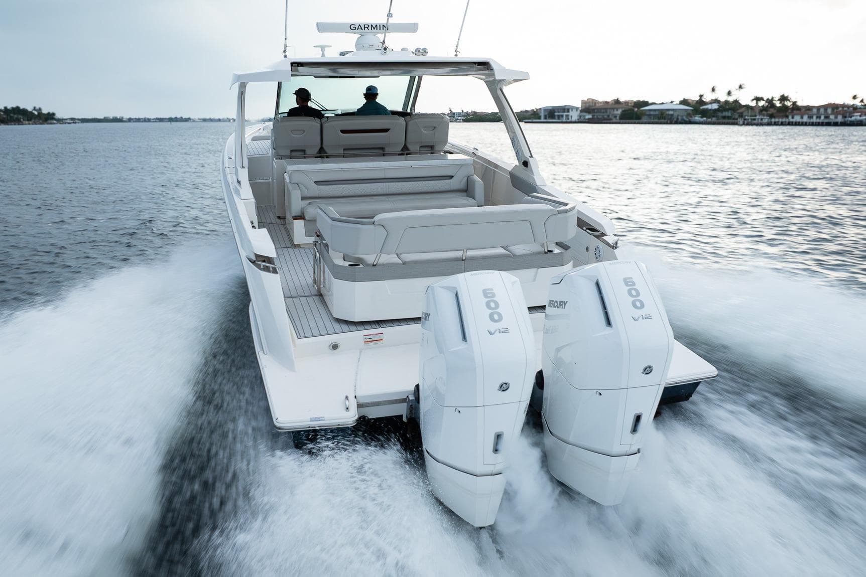2022 Tiara Sport 43 LS boat cruising with dual Mercury 600 V12 engines.