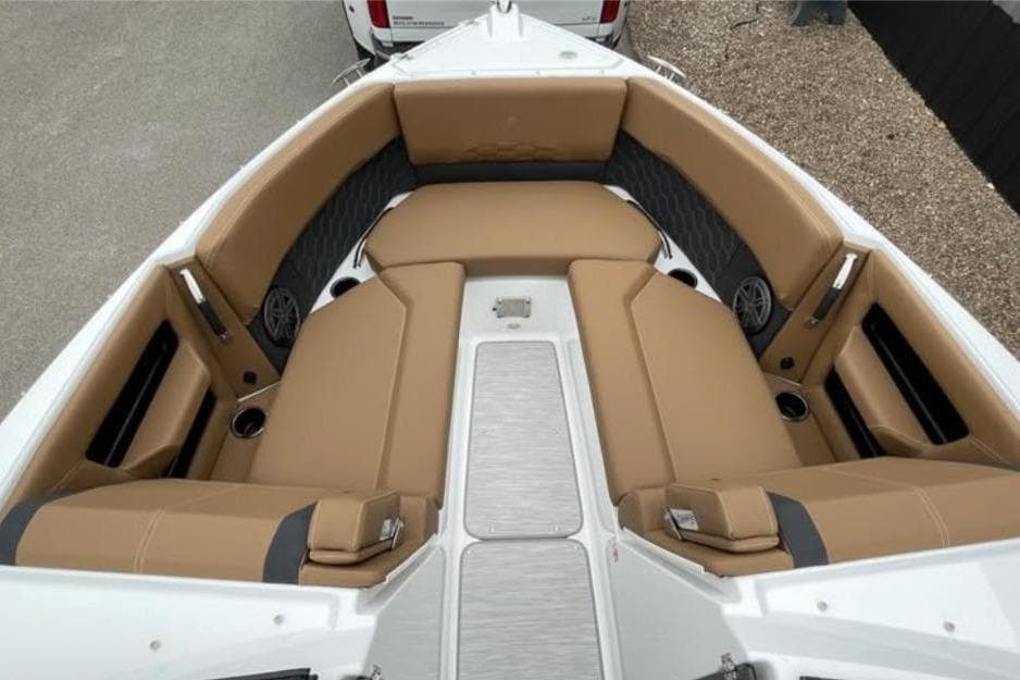 2026 Four Winns H6 boat interior with tan seating and modern design.