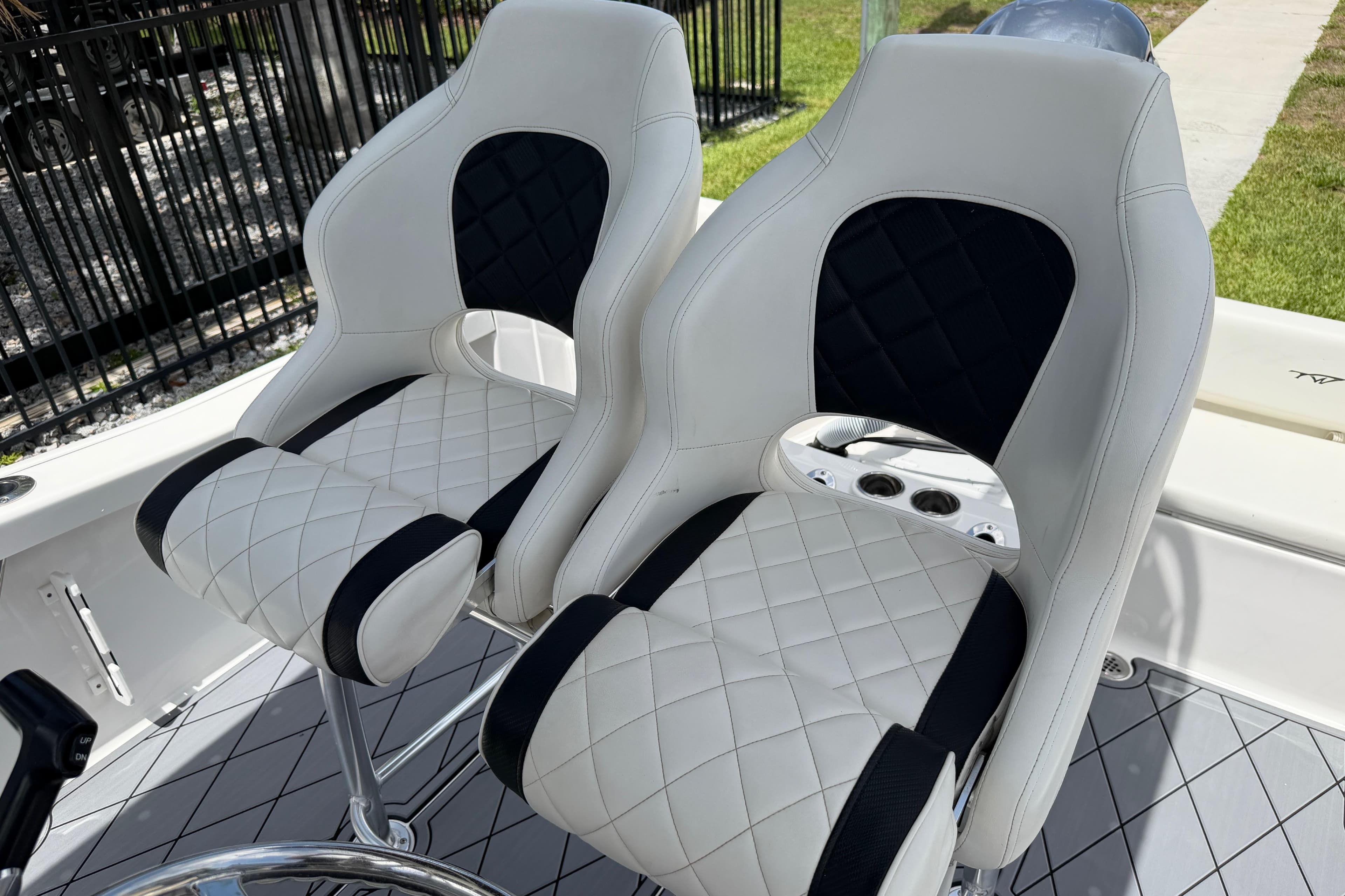 2023 Tidewater 198 CC Adventure boat seats with quilted white and black design.