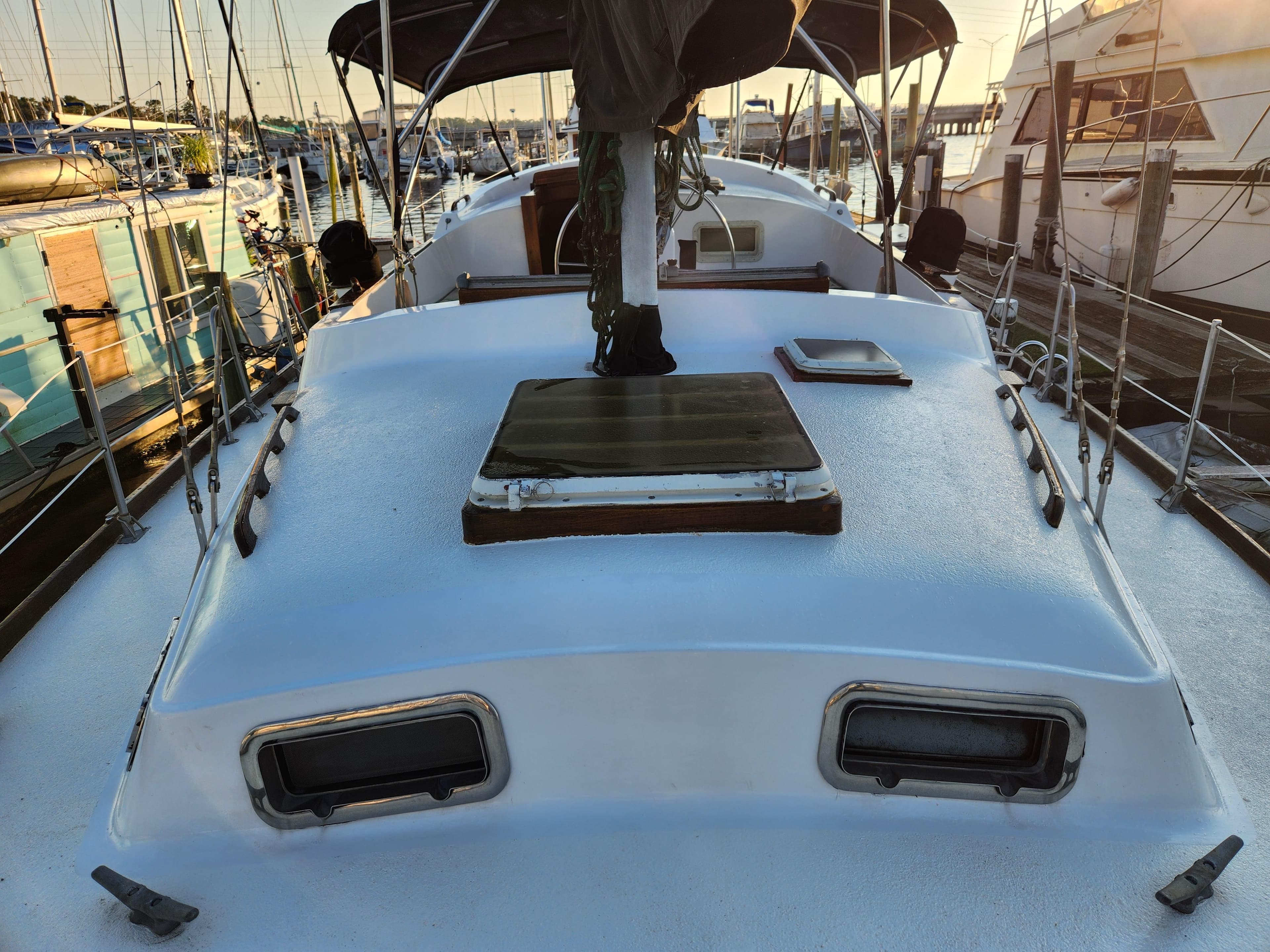 1979 Morgan 45 Ketch sailboat docked at marina, featuring deck and cabin details.