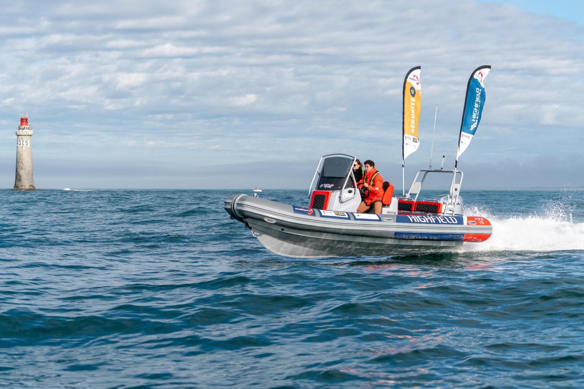 Highfield Patrol 660 boat 2026 on the sea with lighthouse in background.