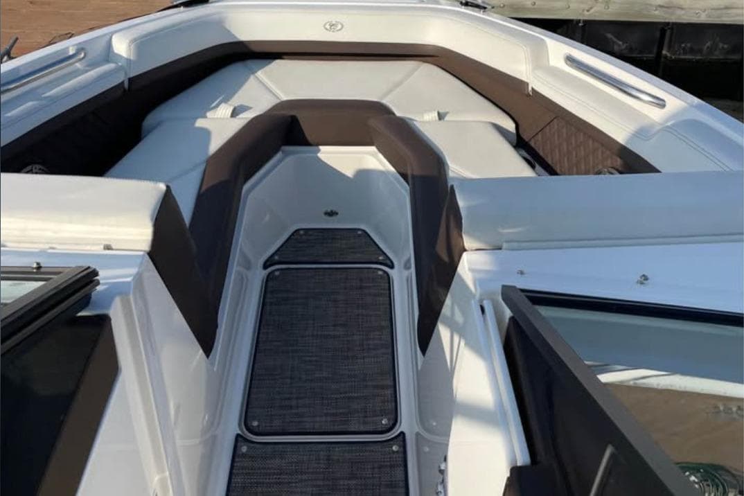 2022 Cobalt R4 Outboard boat interior with cushioned seating and sleek design.