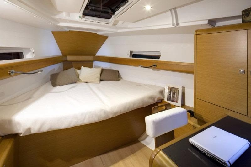 Manufacturer Provided Image: 2017 Jeanneau Sun Odyssey 419 interior cabin with bed, desk, and storage.