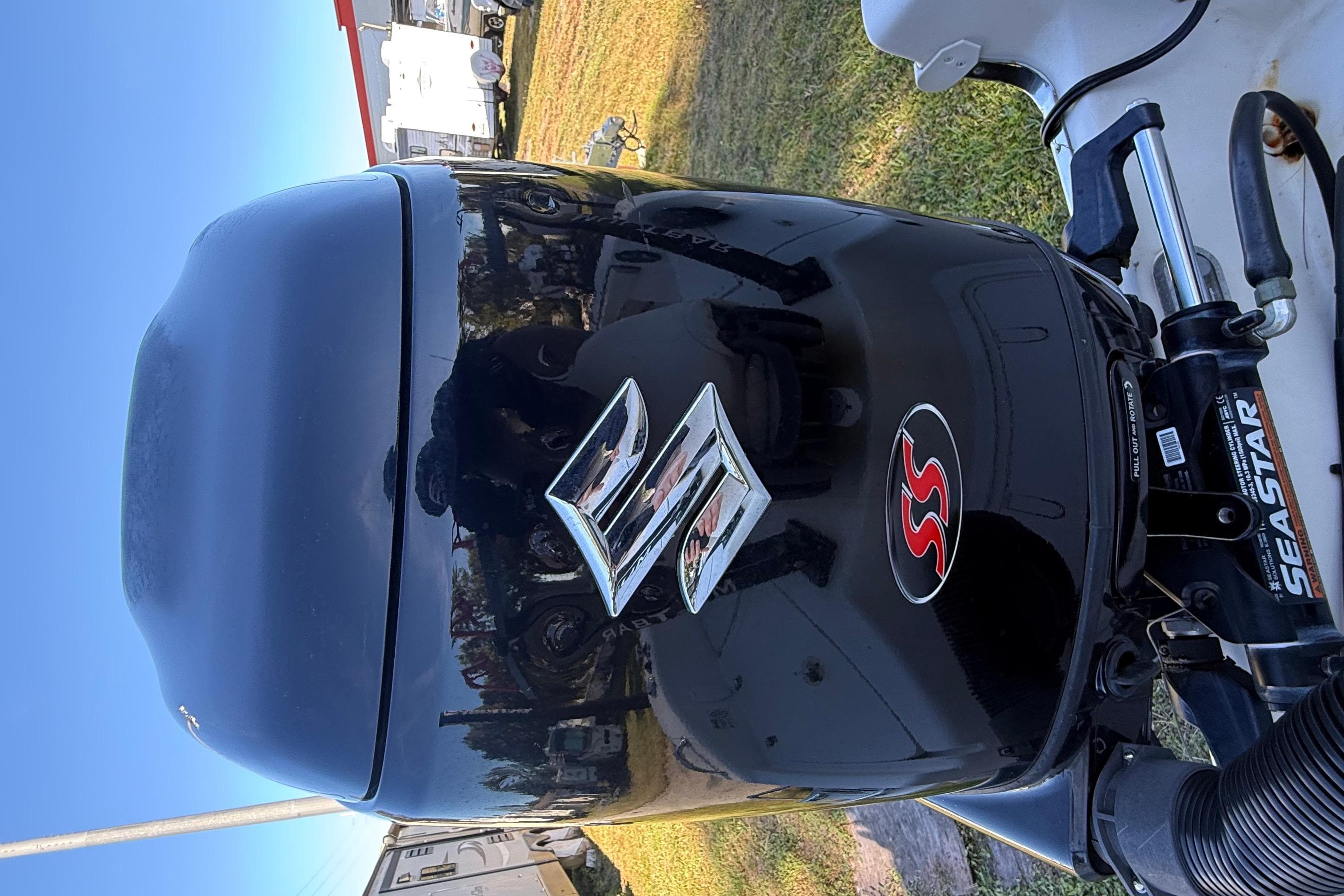 2021 Carolina Skiff 26 Ultra Elite with Suzuki outboard motor, SeaStar steering.