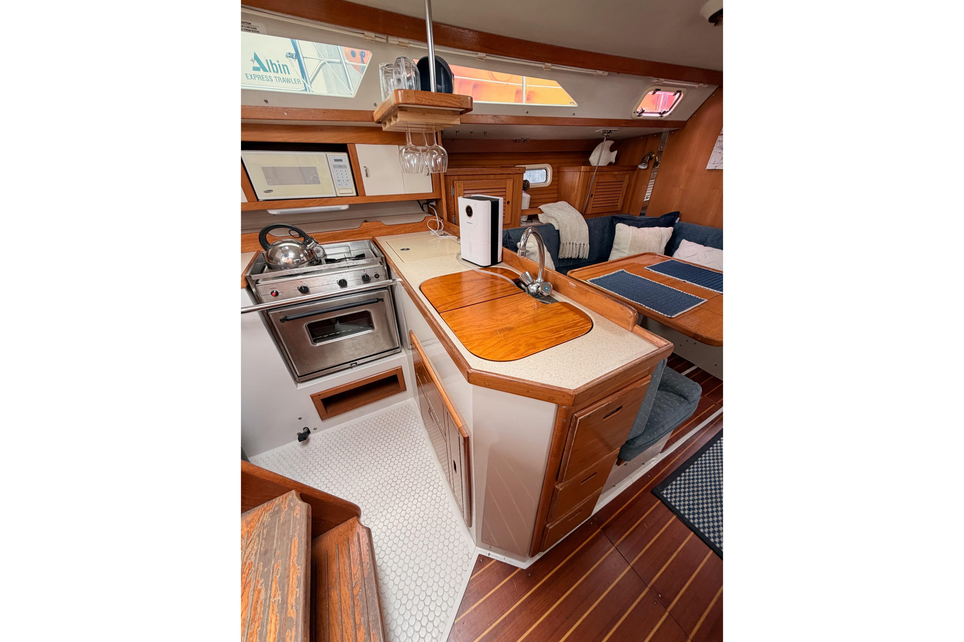 Interior of 1996 Catalina 36 MkII sailboat with kitchen and seating area.
