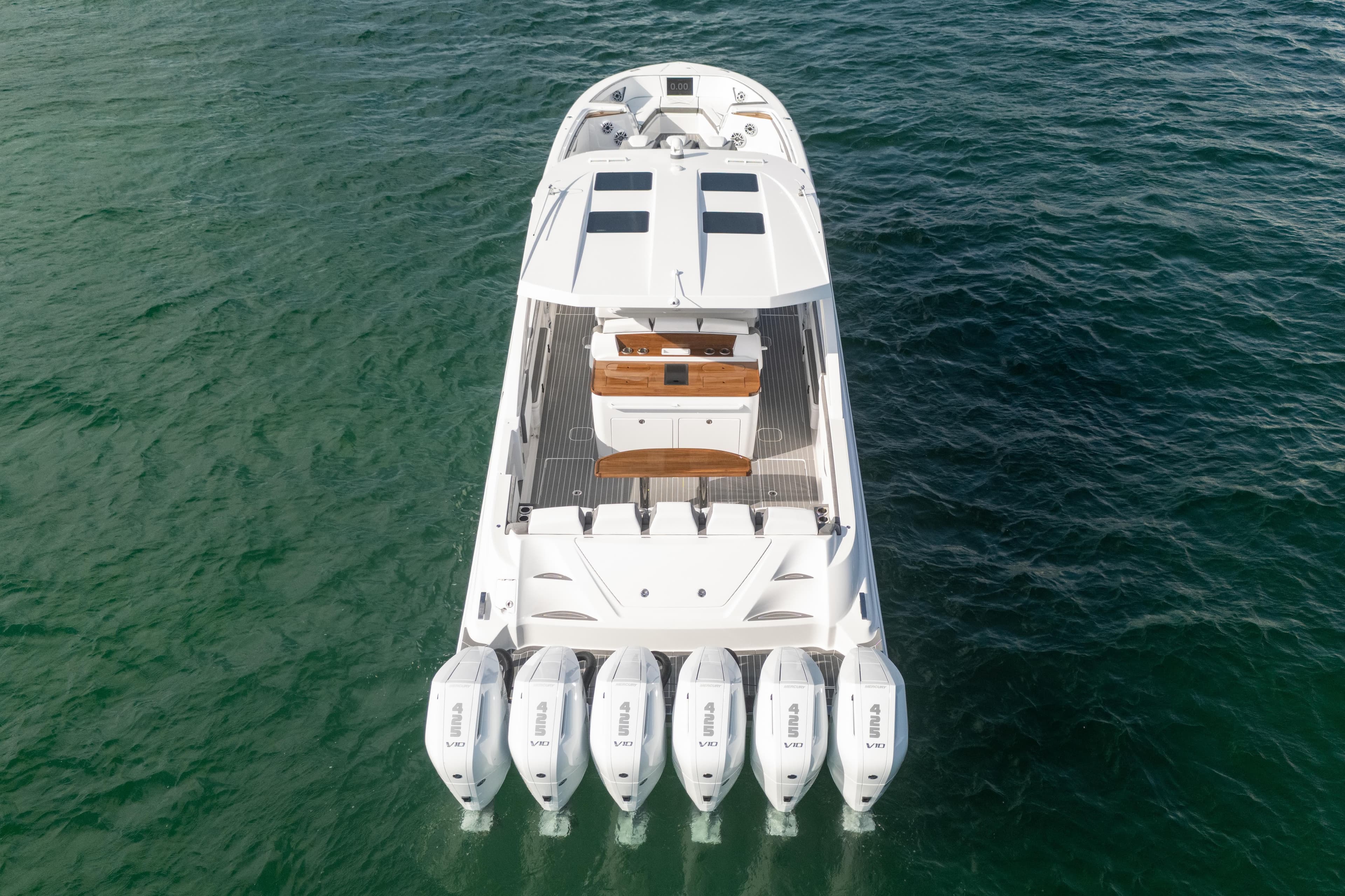 Aerial view of 2026 Deep Impact 499 Sport Luxury Edition boat on water.