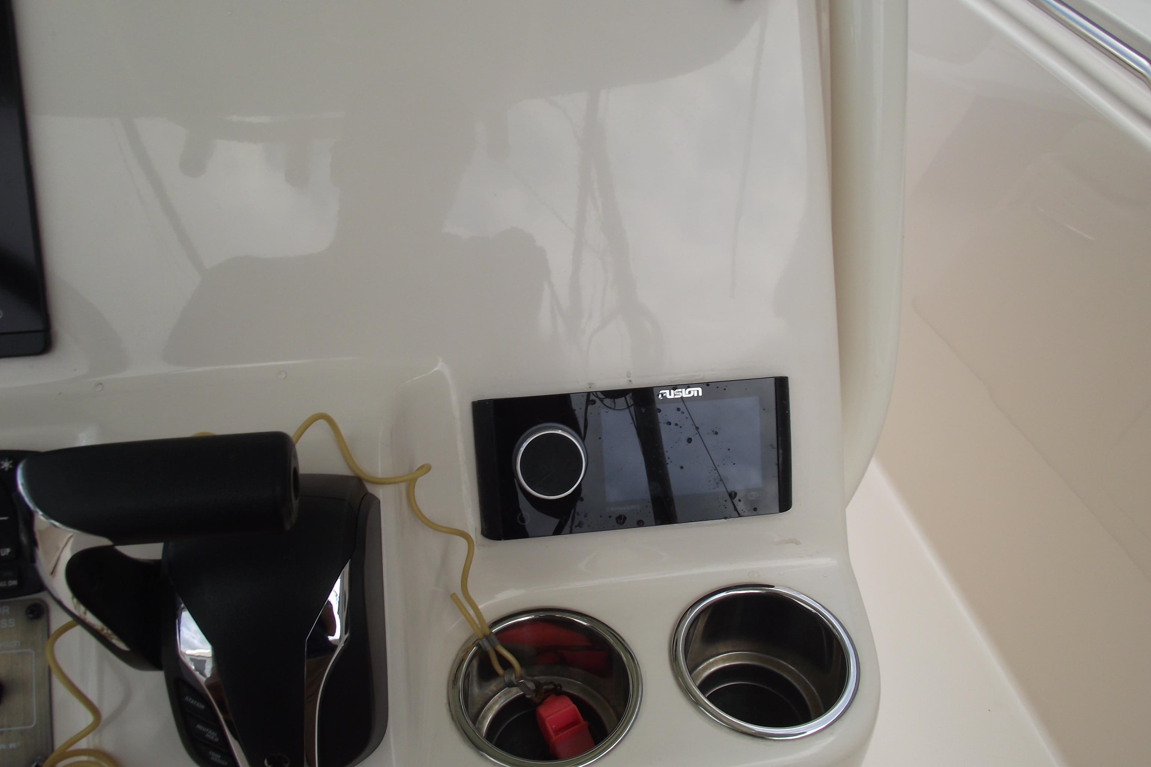 Control panel of 2023 Grady-White Fisherman 236 boat with Fusion audio system.