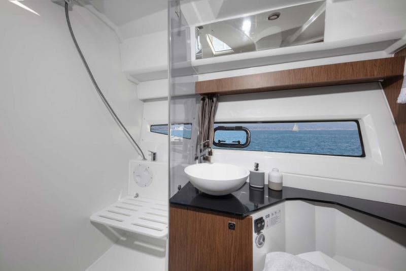 Interior view of Jeanneau NC 1095 yacht bathroom, 2022 model.