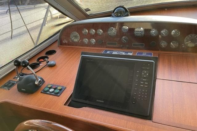 Control panel of a 1998 Storebro 430 Royal Cruiser with navigation equipment.