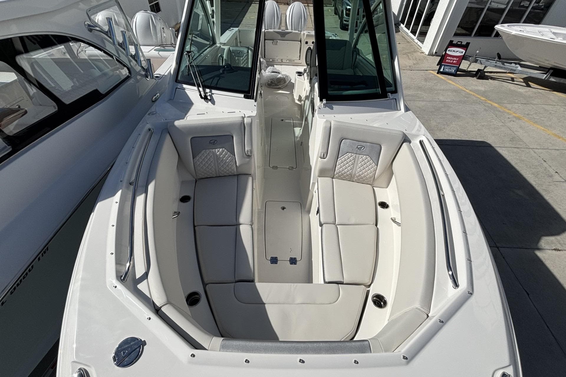 2026 Sailfish 316 DC boat with spacious seating and modern design.