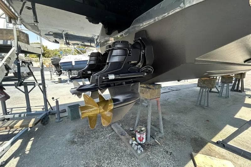 Stern view of a 2006 Wally 45 yacht with dual propellers in a boatyard.