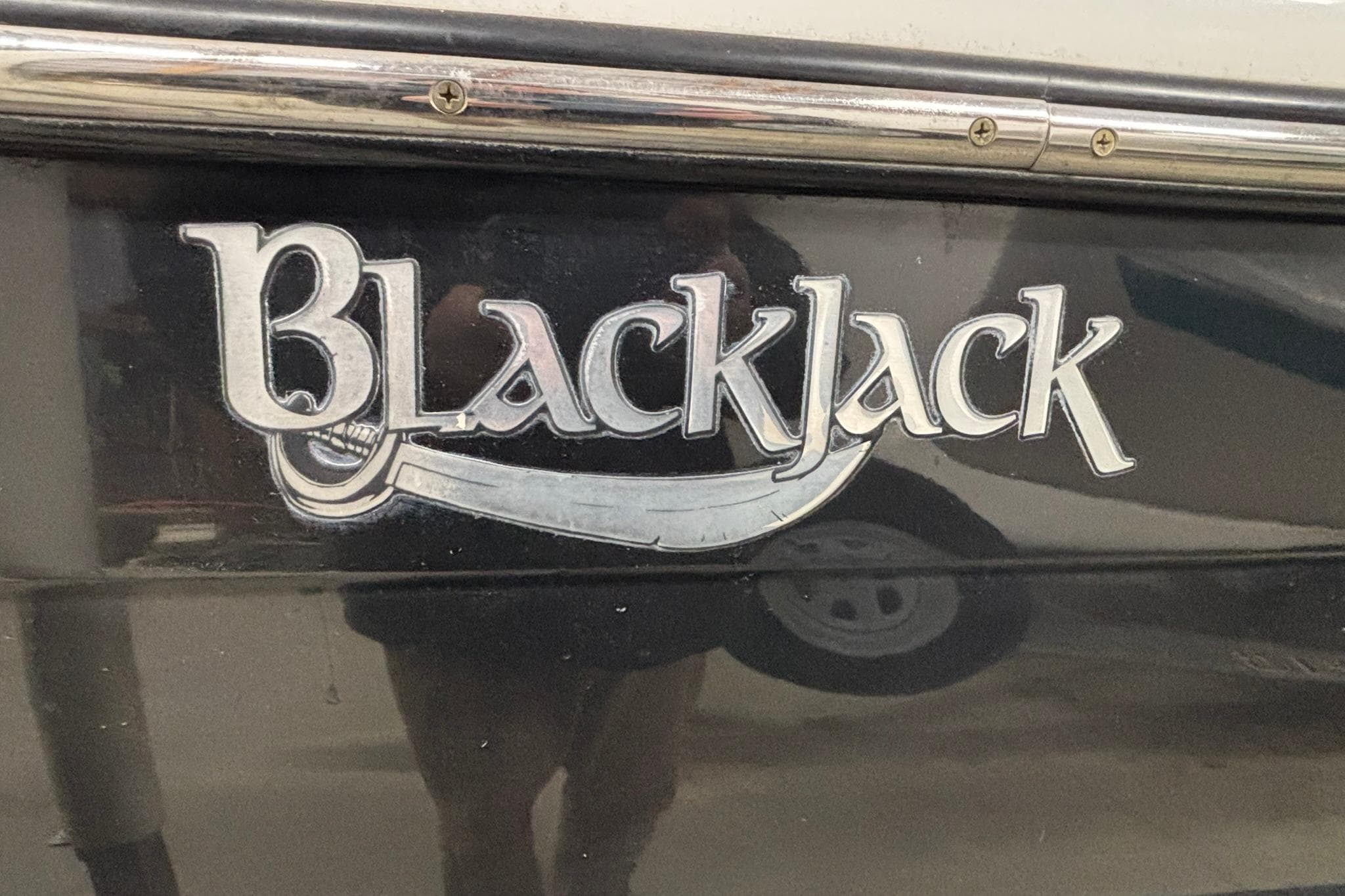 BlackJack 224 logo on a 2012 model boat, featuring a sleek design.