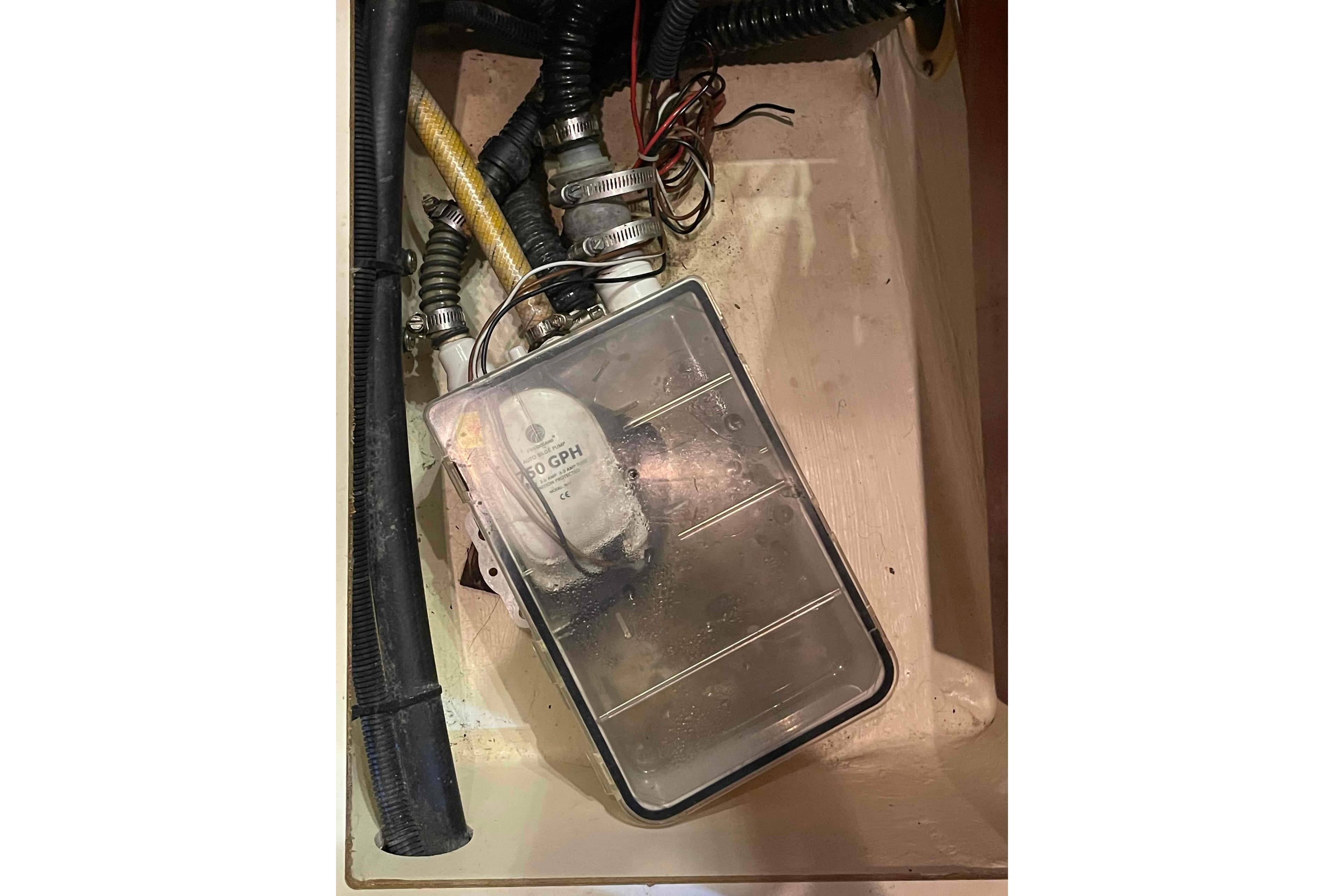 Bilge pump system in 2010 Hunter 45 Center Cockpit sailboat.