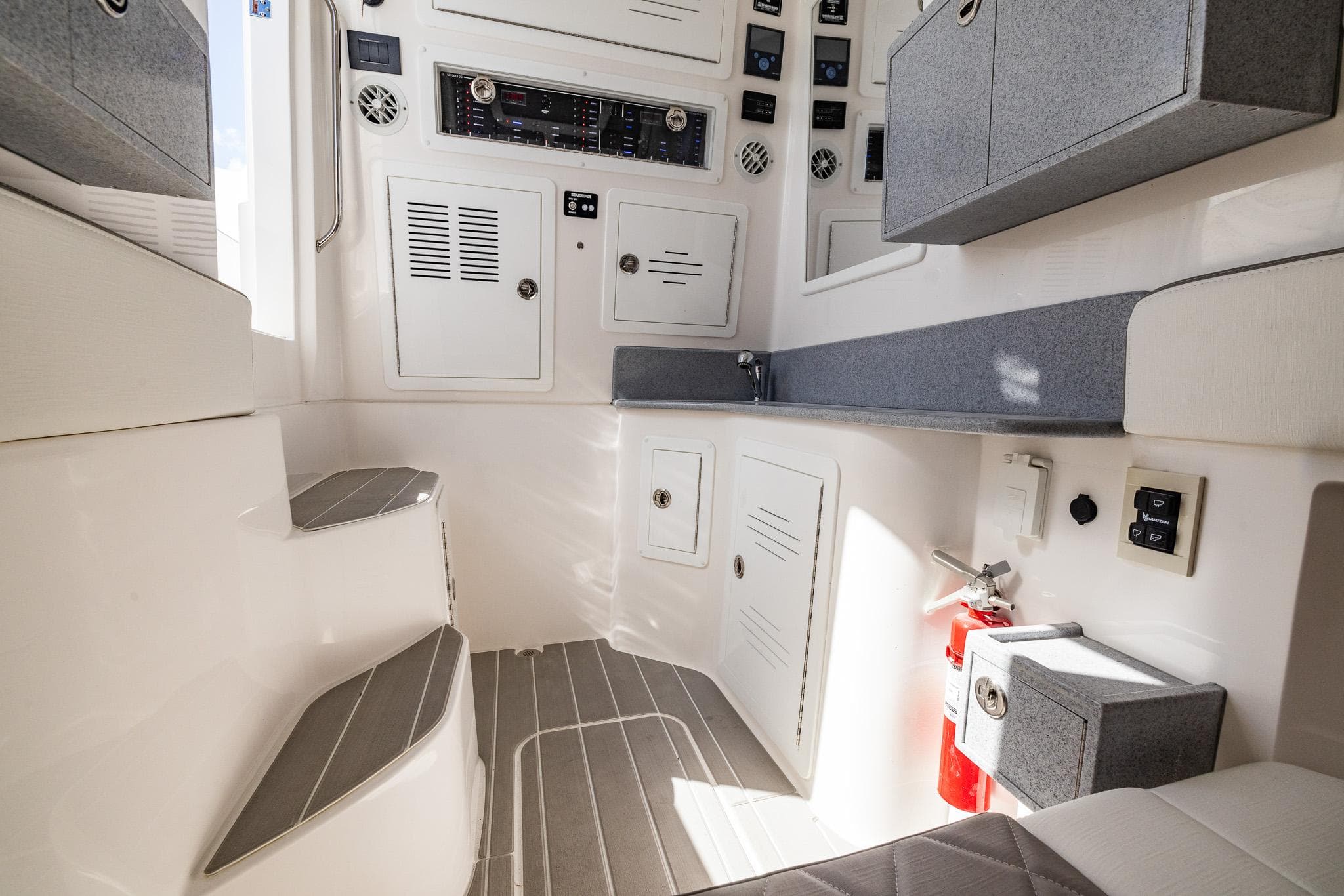 Interior of 2025 Blackwater 43 Sportfish boat, featuring modern controls and seating.