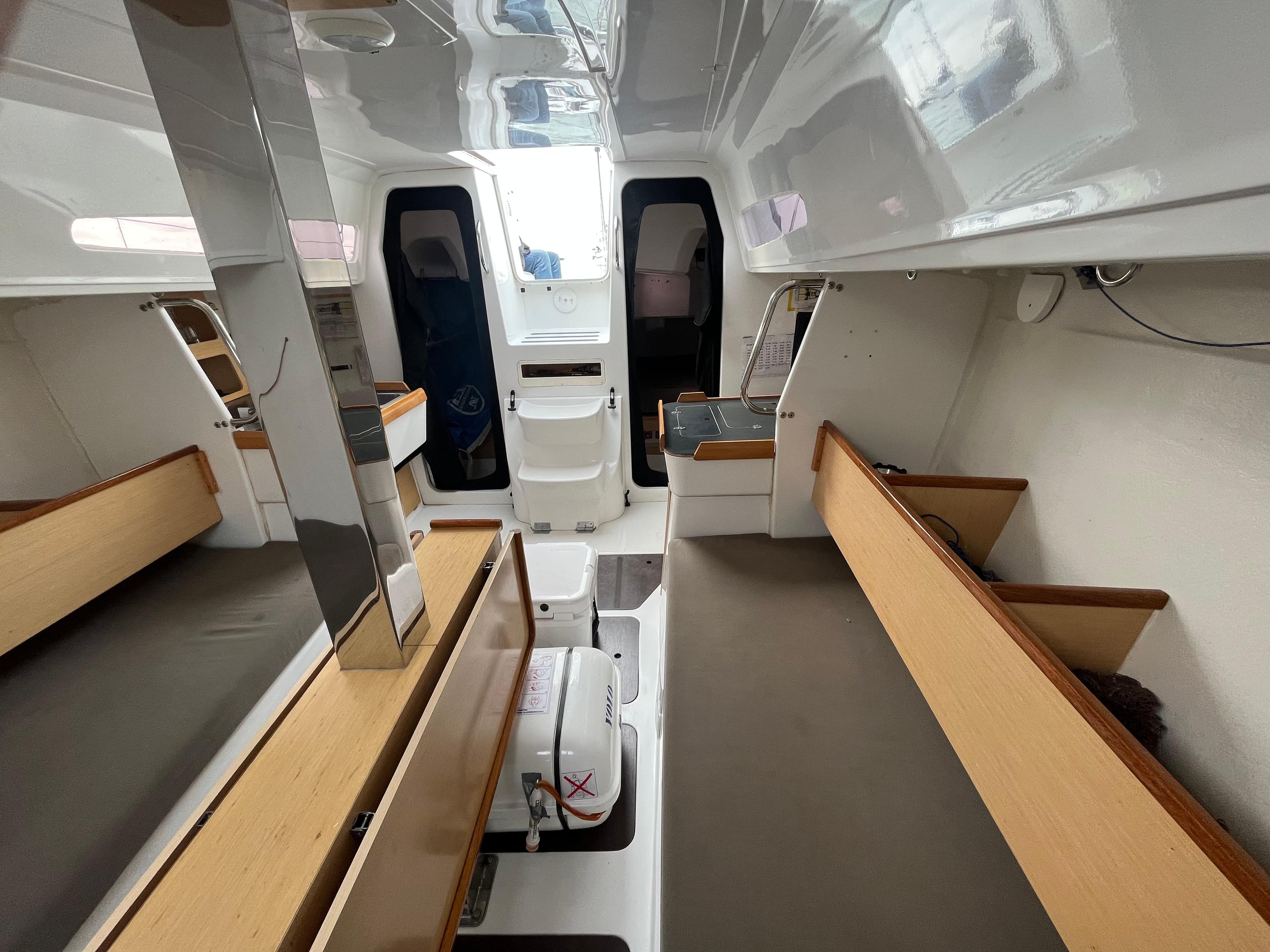 Interior of 2013 Jeanneau Sun Fast 3600 sailboat with modern design and wooden accents.