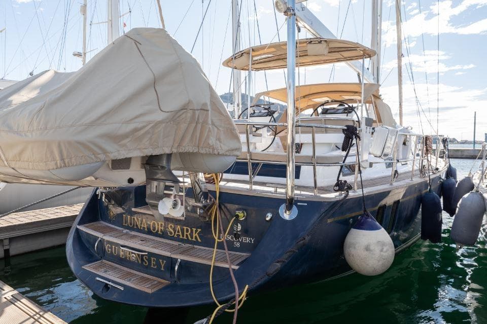 Luxury yacht "Luna of Sark," Discovery 58, docked in marina, 2015 model.