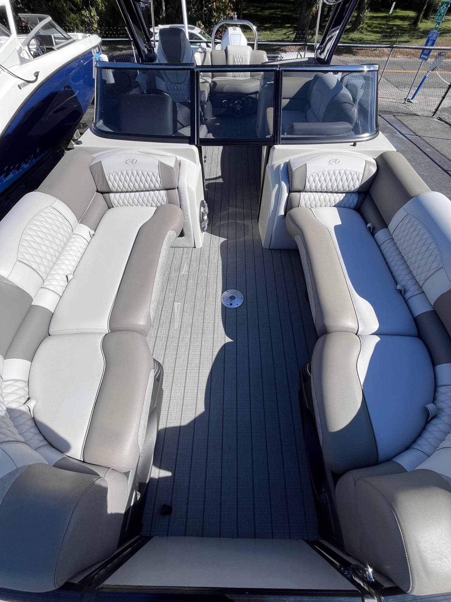 2023 Avalon Excalibur Elite Windshield 27' boat interior with luxurious seating.