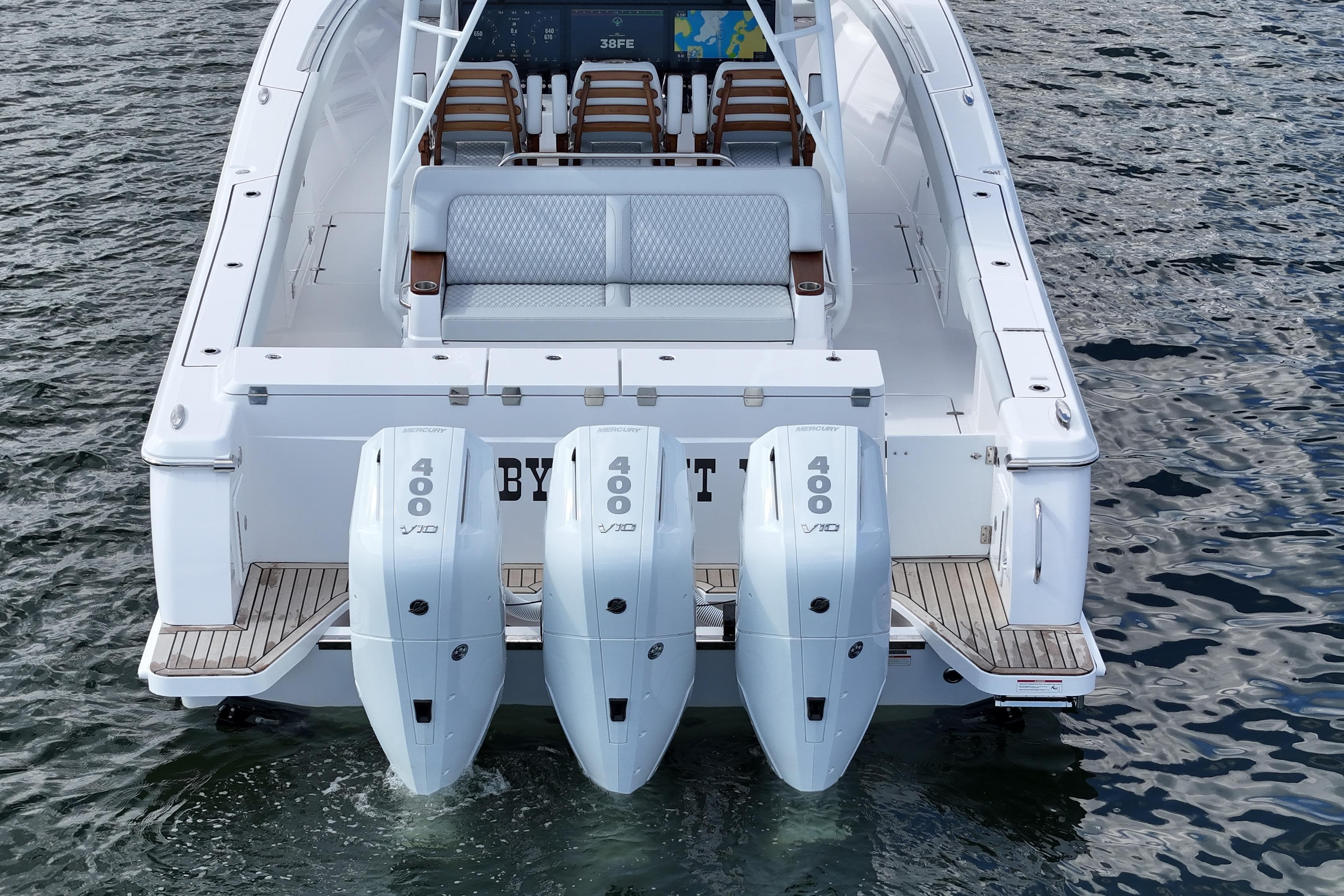 2025 Southport 38 FE boat with triple 400 V10 engines on water.