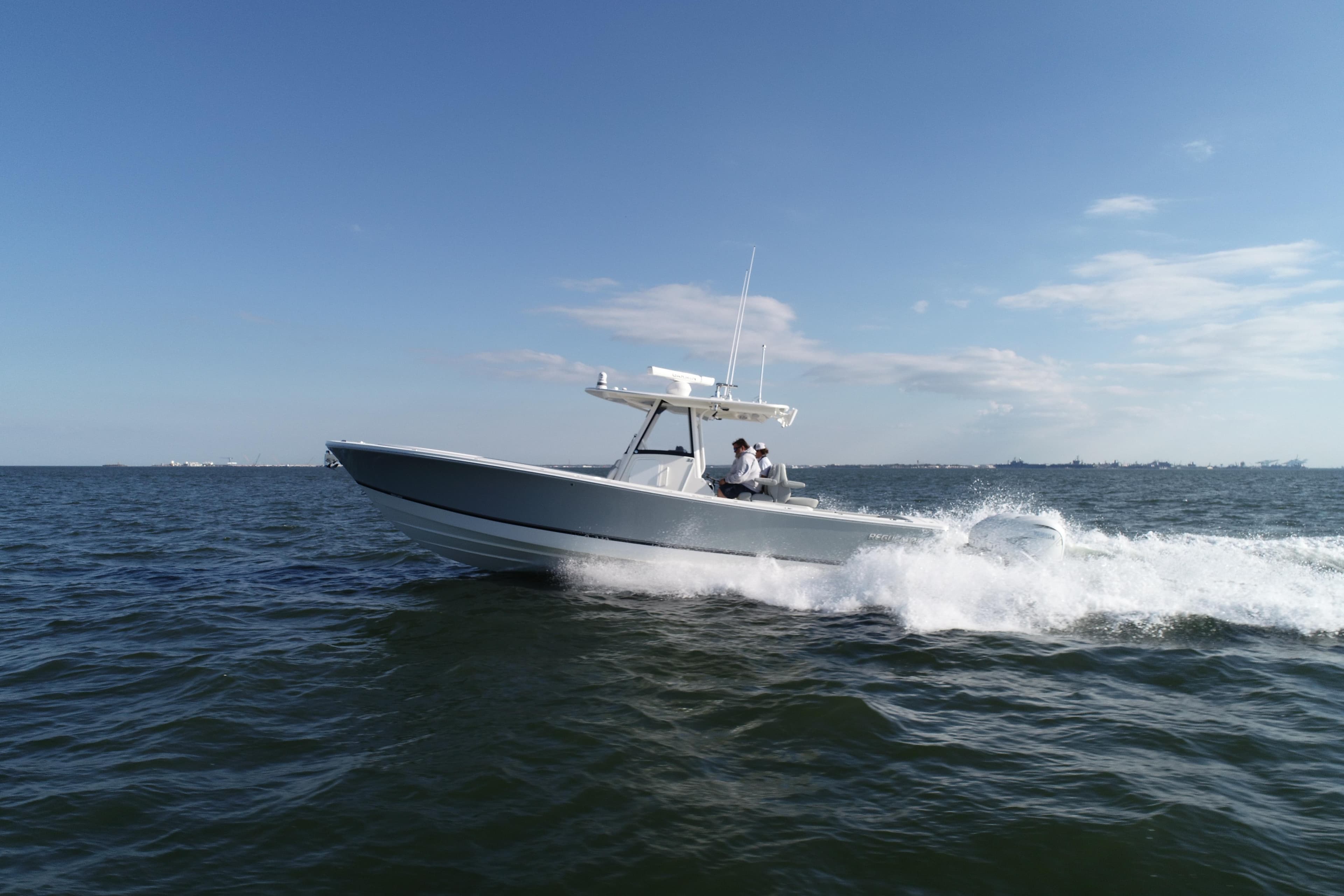 2021 Regulator 34 Center Console boat cruising on open water.
