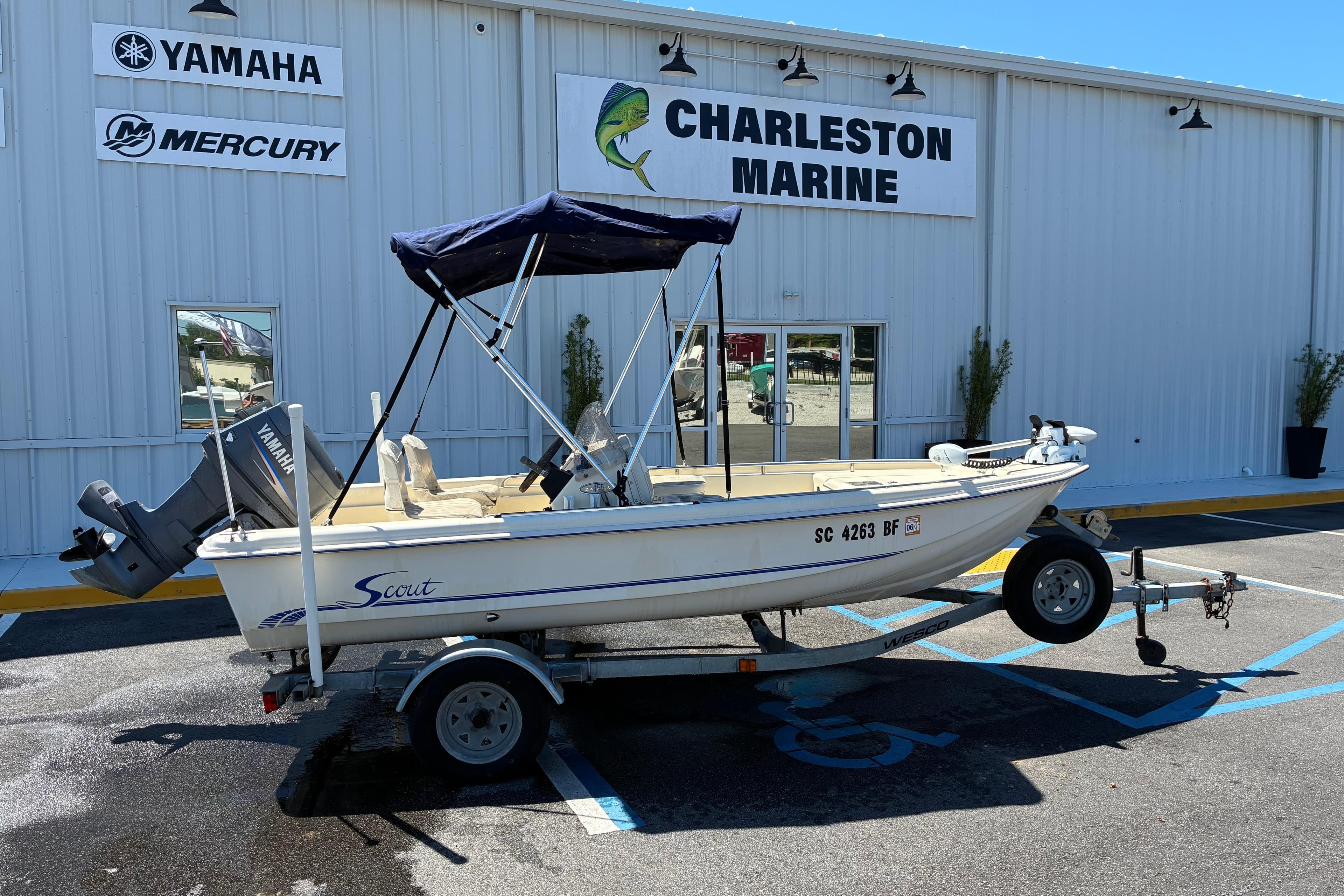 1999 Scout 155 Dorado boat on trailer at Charleston Marine dealership.
