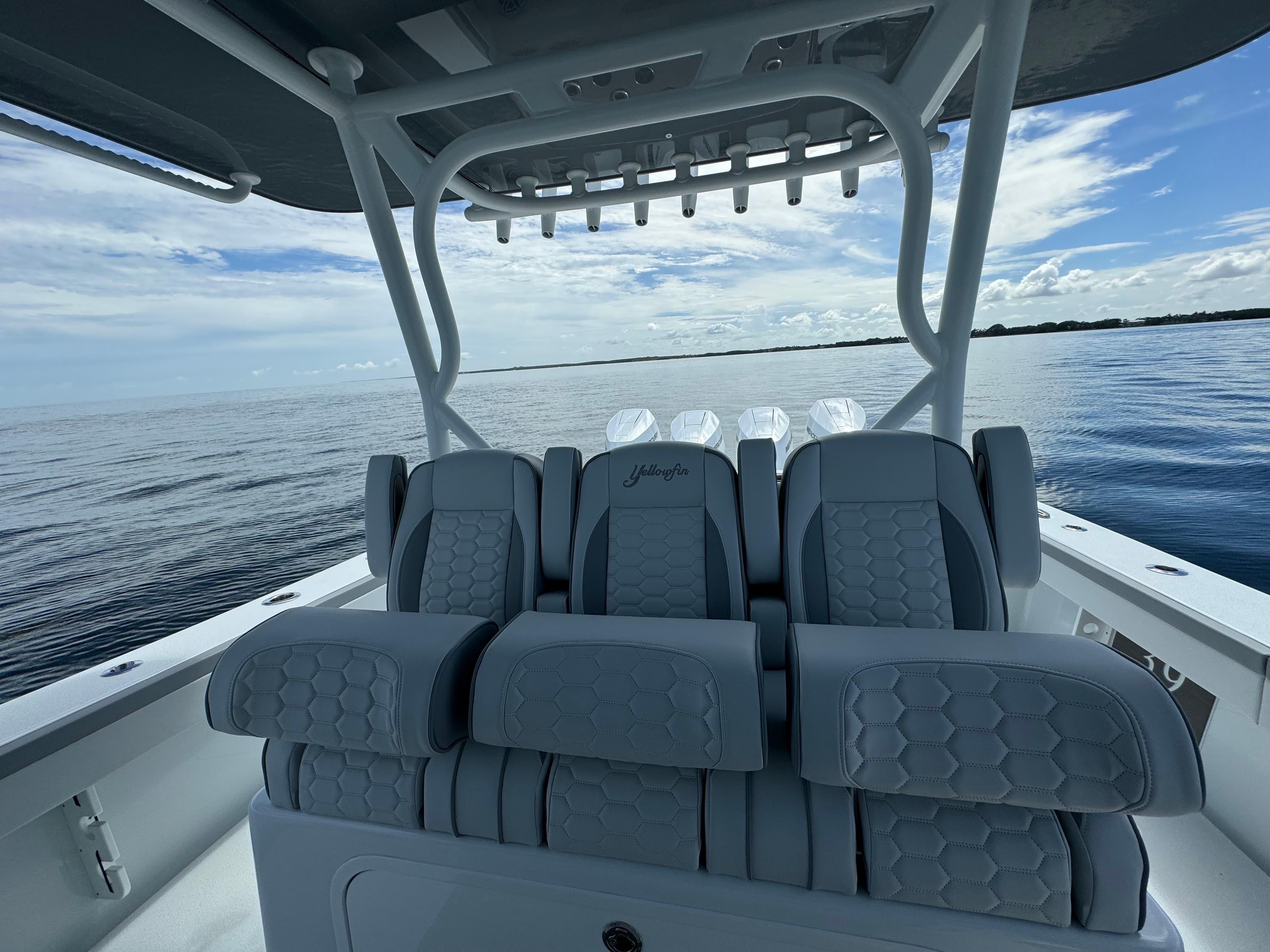 2024 Yellowfin 39 boat interior with luxurious seating on calm waters.