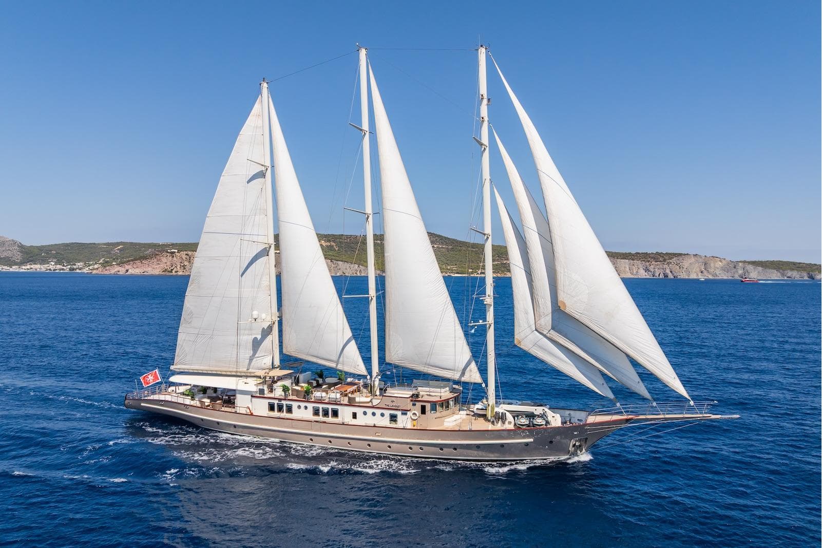Aegean Yacht 3 Mast Schooner sailing in clear blue waters, 2009 model.