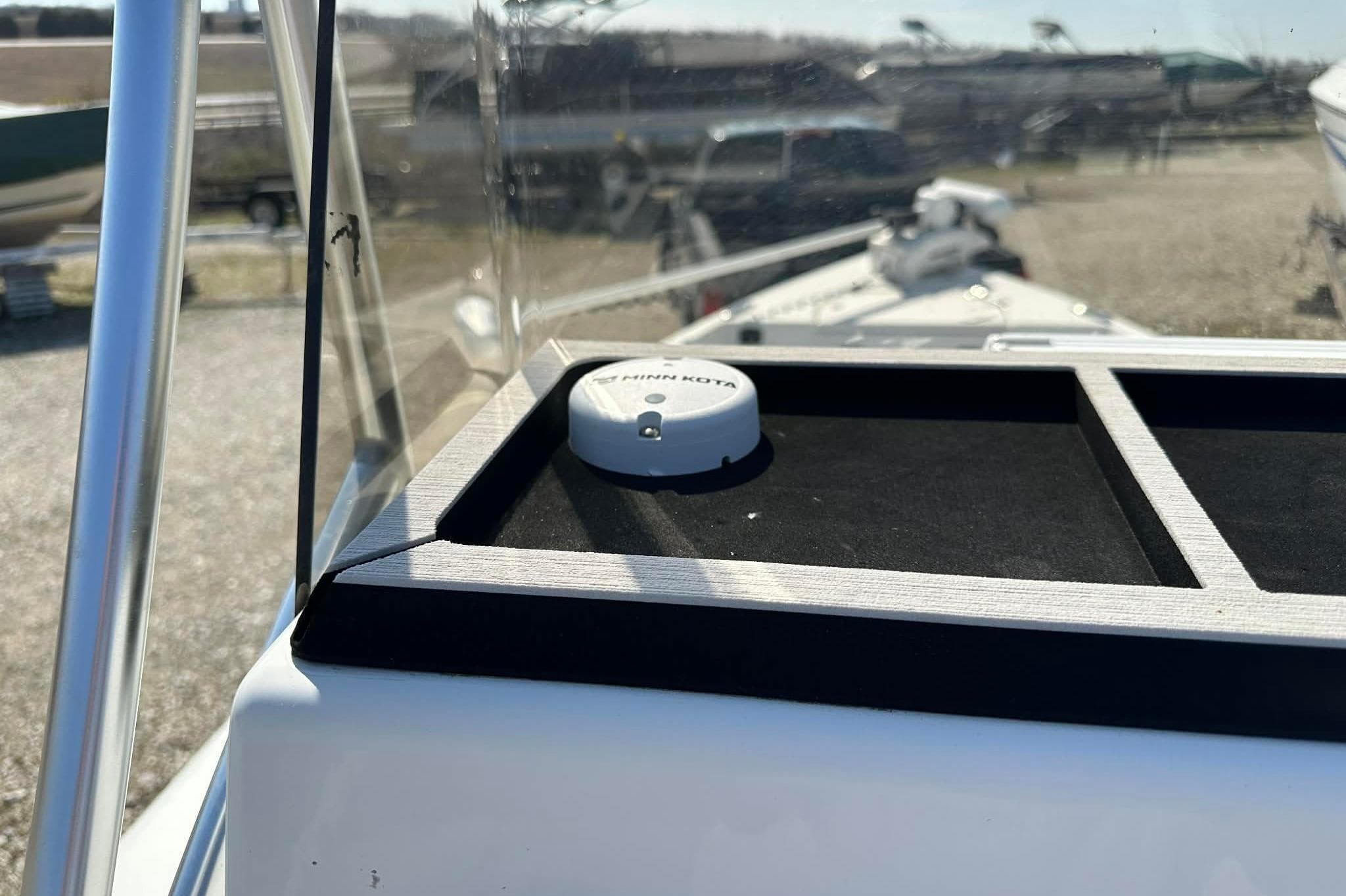 Close-up of 2022 BayRider Kencraft 219 Bay boat dashboard with Minn Kota accessory.