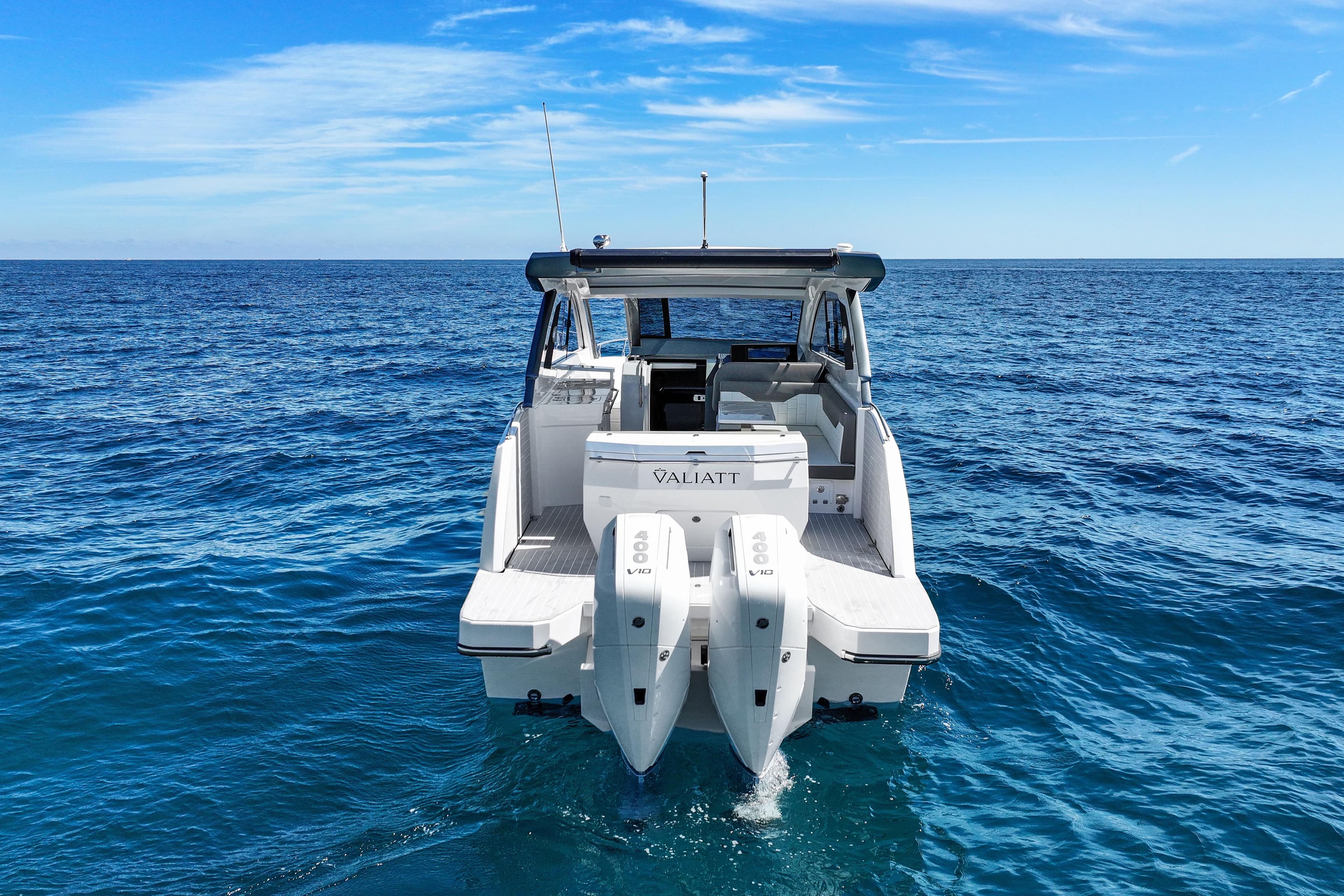 2025 VALIATT YACHTS 380 Bowrider on open sea, showcasing sleek design and powerful engines.