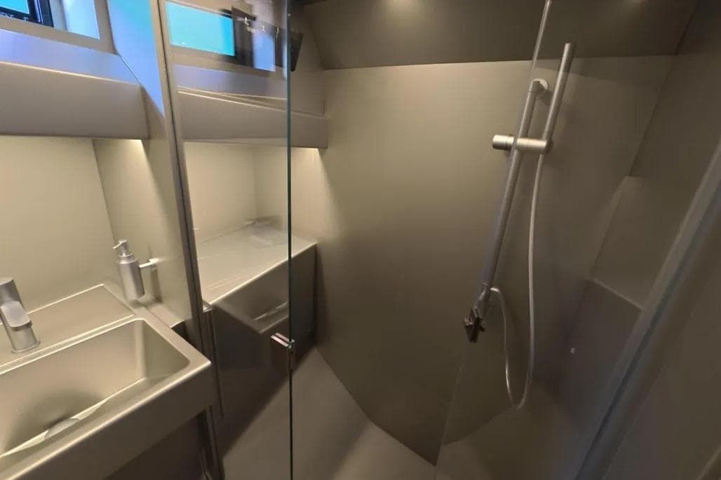 Modern bathroom interior in 2024 Wally 43 X yacht, featuring sleek design and fixtures.