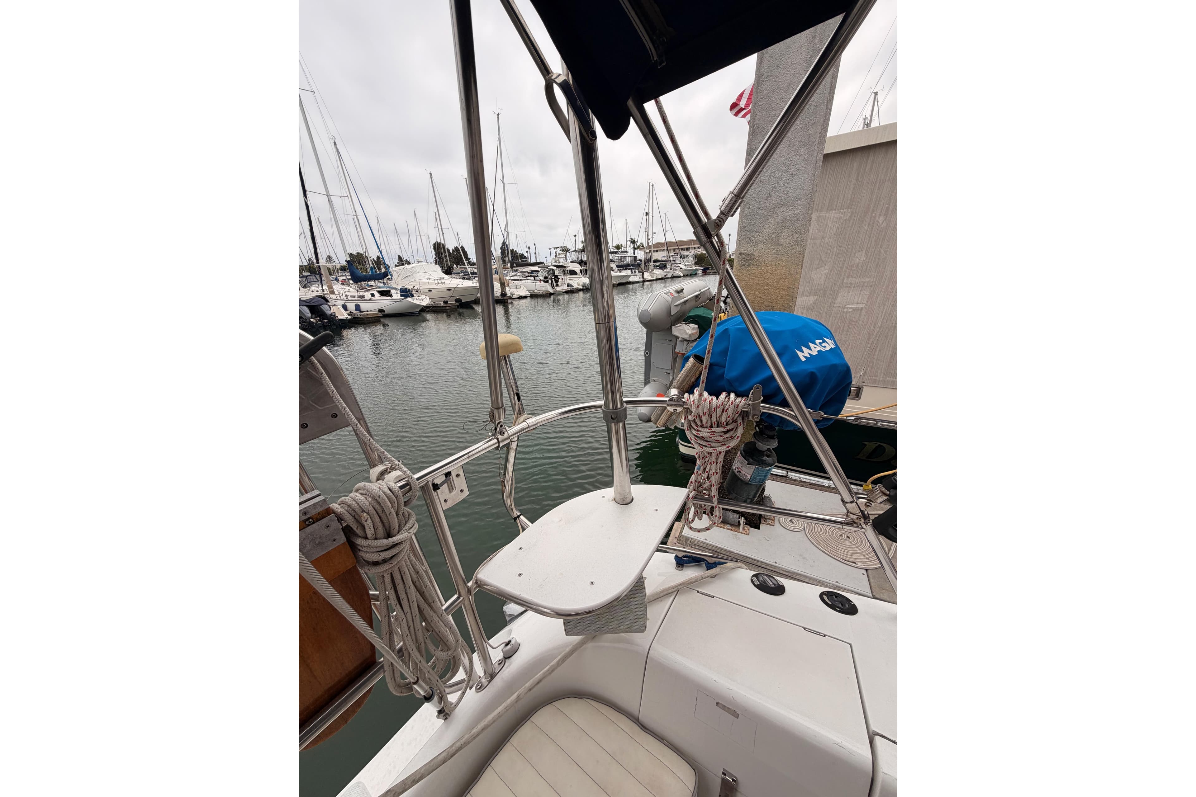 Cockpit view of a 1996 Catalina 36 MkII sailboat docked in a marina.