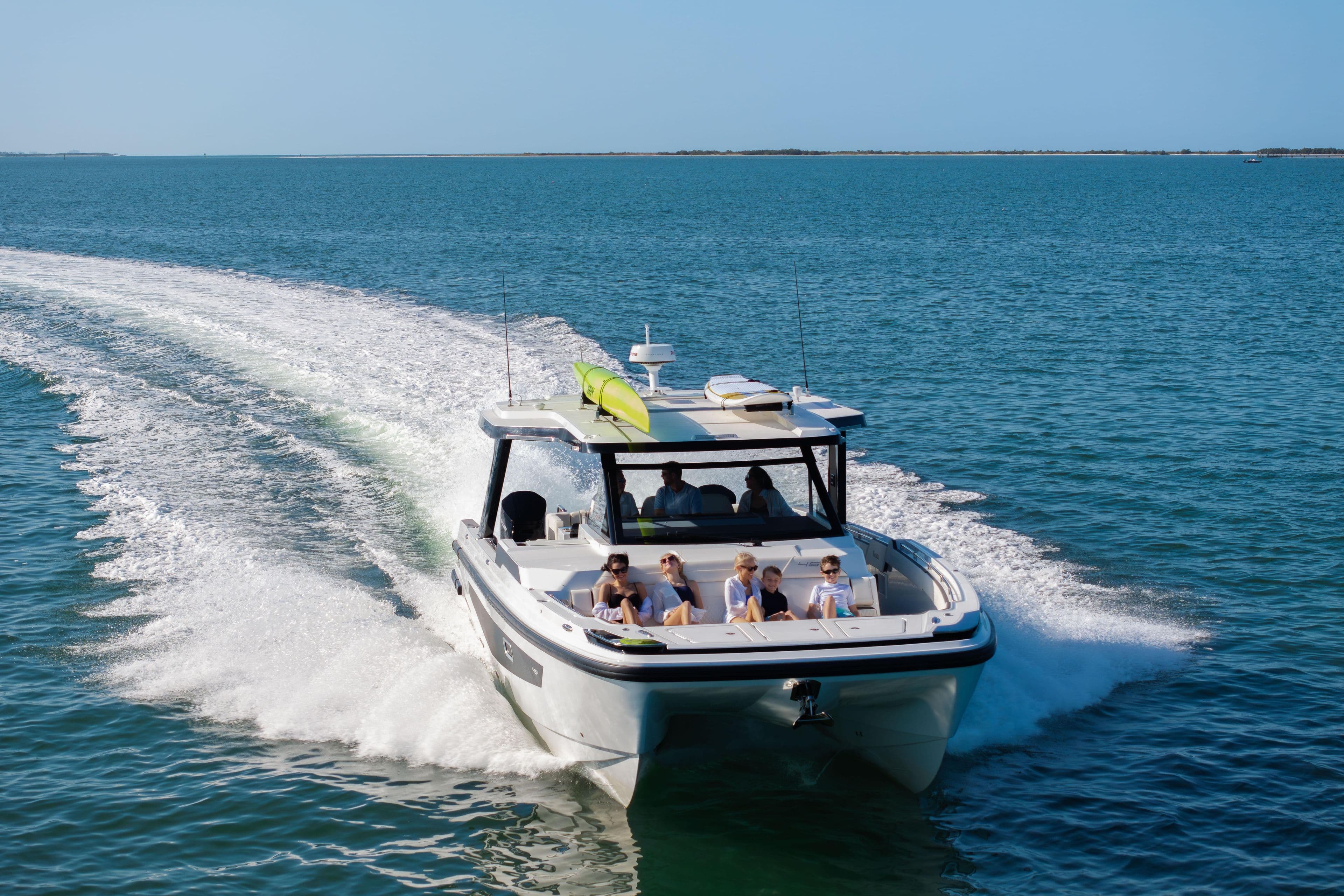 Aquila 45 Sport 2026 cruising on open water with passengers enjoying the ride.