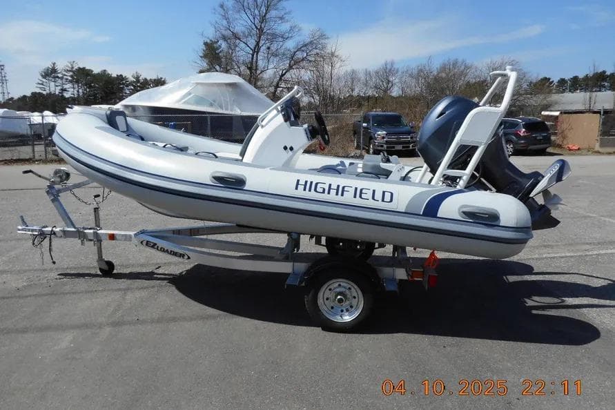 Highfield Classic 400 inflatable boat on trailer, 2025 model, parked outdoors.